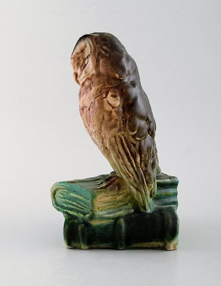 Michael Andersen. Rare figure in glazed ceramics. Two owls sitting on books, 1940s.
Measures: 20.5 x 13 cm.
In very good condition.
Stamped.
Model number: 322.