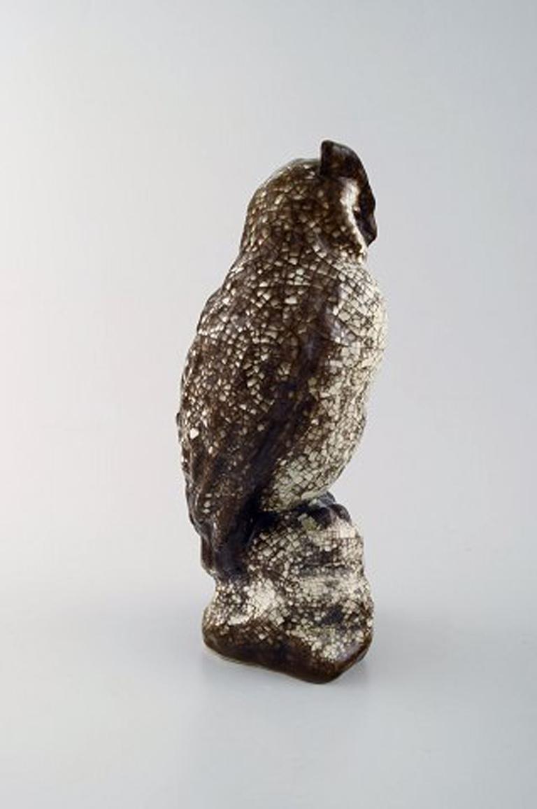Michael Andersen. Rare owl in crackled glazed stoneware. Beautiful glaze in brown and white shades, 1950s-1960s
In very good condition.
Stamped.
Measures: 23 x 10 cm.