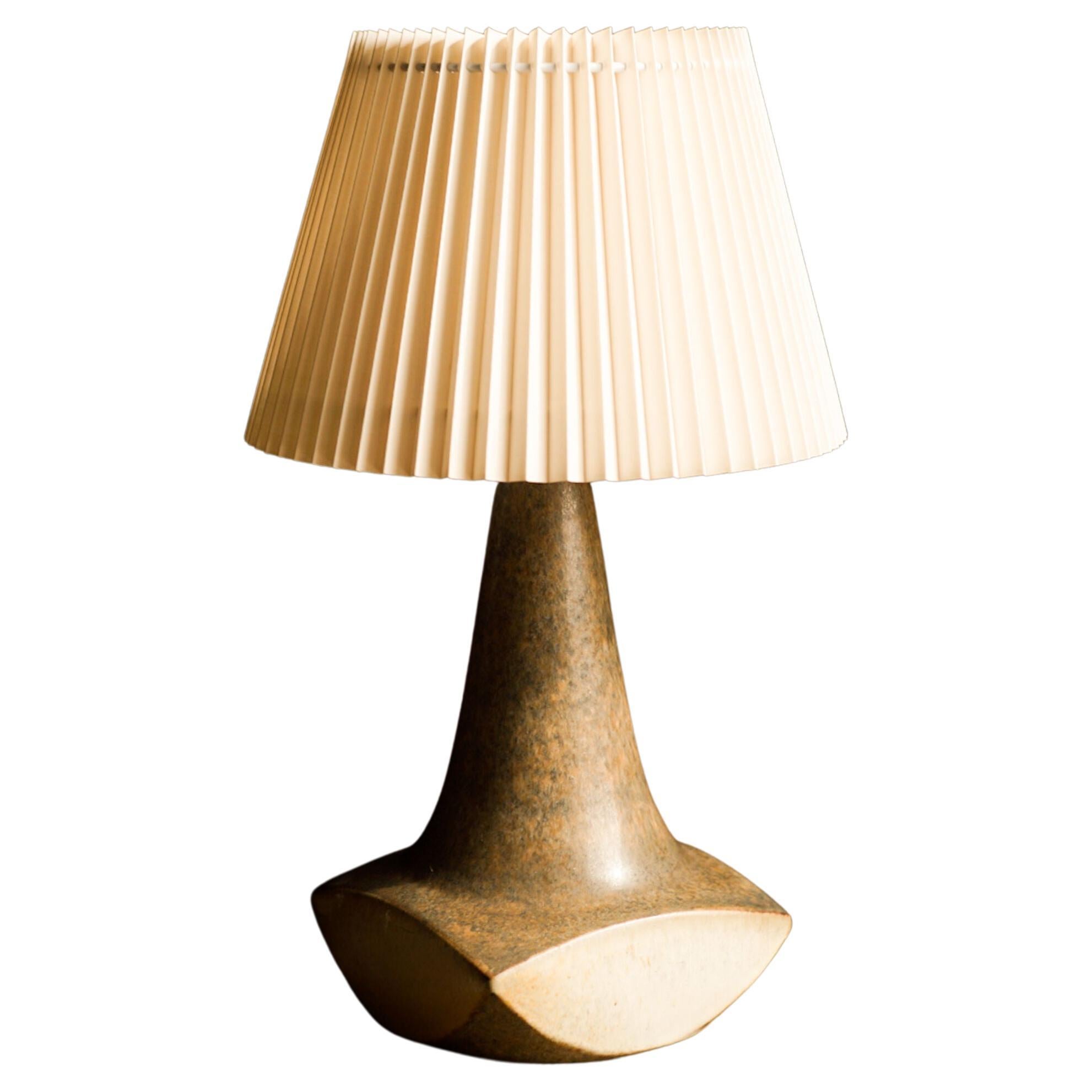A stoneware table lamp handmade by Michael Andersen & Son located on the island of Bornholm in Denmark in the 1960s.

Stamped and signed on the base.

Sold without lampshade. Height includes socket. fully functional and in beautiful condition.