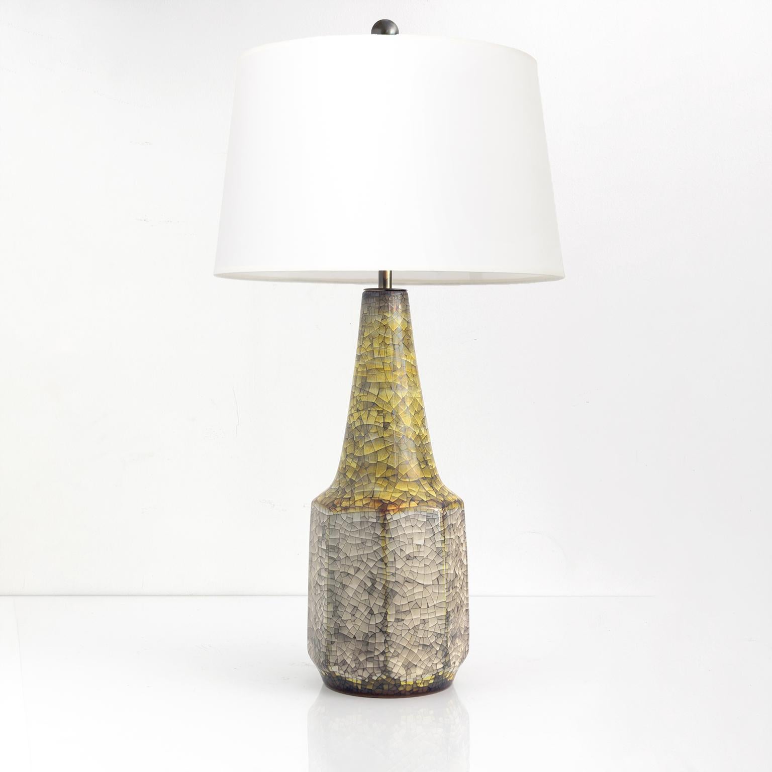 Michael Andersen & Son beautifully colored crackle glazed lamp, with conical neck emerging from an octagonal base. The lamp has newly created custom patinated brass hardware which includes: the stem, “S” form cluster with candelabra sockets and a