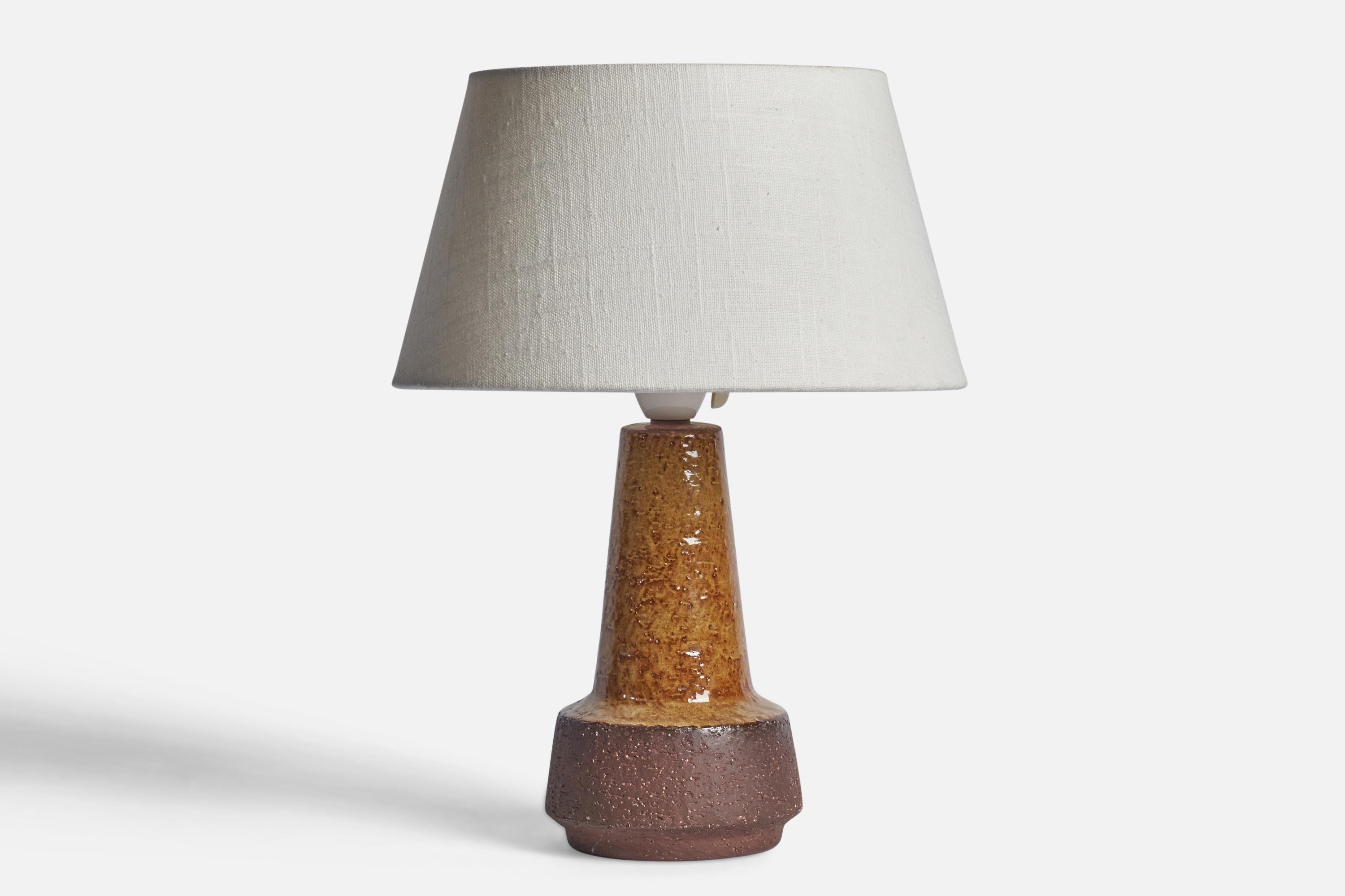 A brown semi-glazed table lamp designed and produced by Michael Andersen, Bornholm, Denmark, 1960s.

Dimensions of Lamp (inches): 10.5” H x 4.75 Diameter
Dimensions of Shade (inches): 7” Top Diameter x 10” Bottom Diameter x 5.5” H
Dimensions of Lamp