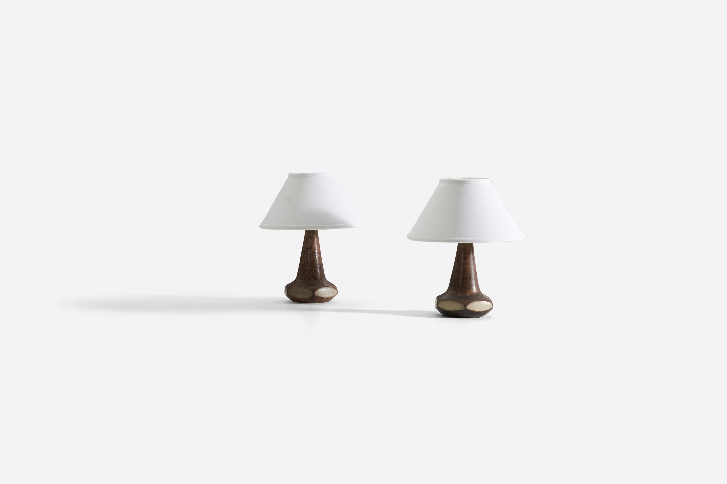 A pair of gray, brown, and black-glazed stoneware table lamps produced by Michael Andersen Keramik. Underside marked and labeled

Sold without lampshade. Dimensions in listing exclude shade.
For reference:
Dimensions of lamp with shade H 12.1” /