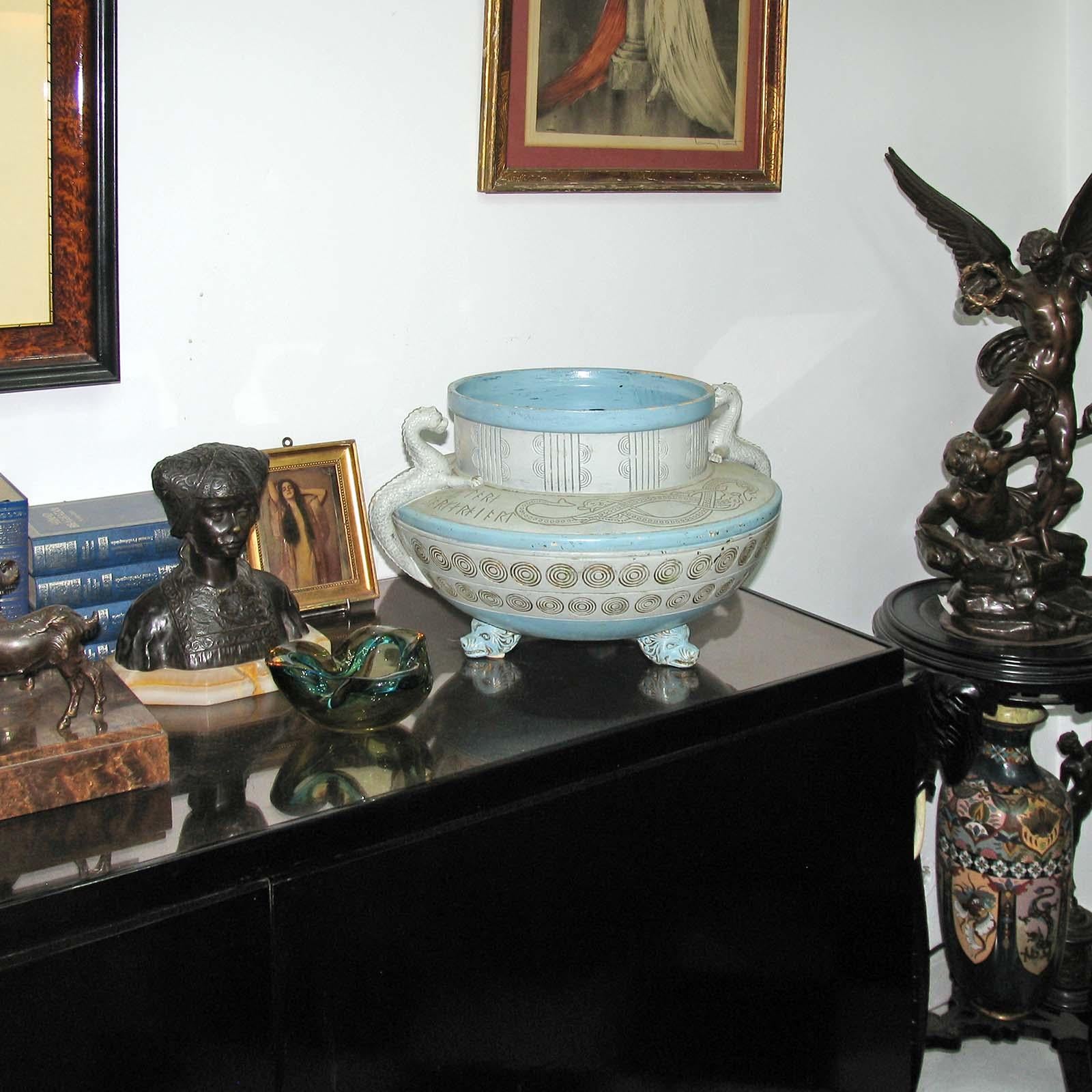Michael Andersen. Very large and rare 'Old Nordic' tub / jar of cold hand painted terracotta in a light shade of sky blue, with accents of gold enhancements.
Richly decorated with encircled pattern in the form of Midgard worms and rune stones: