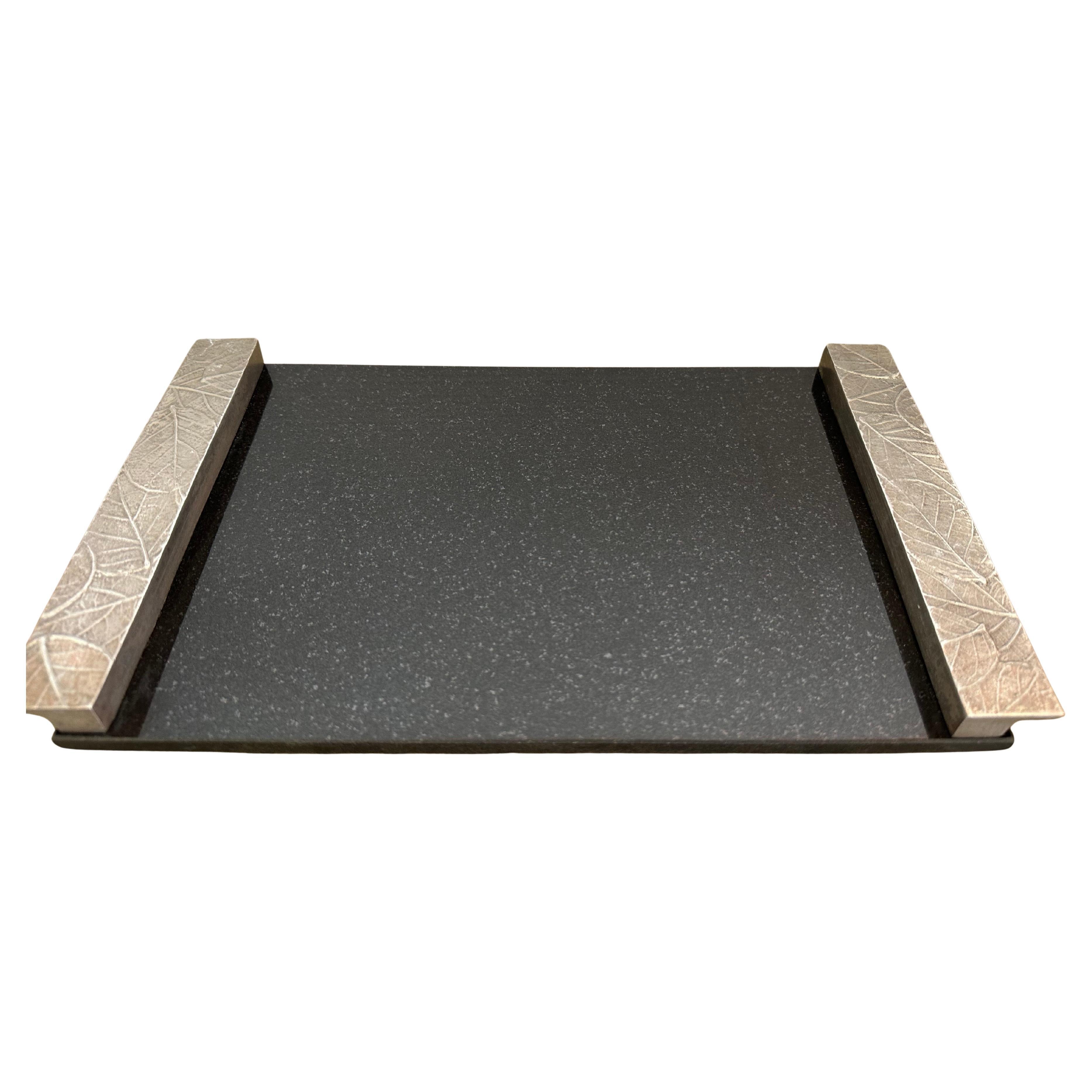 Michael Aram Botanical Leaf Black Granite and Silver-Plated Cheeseboard. The piece is in good condition and measures 13