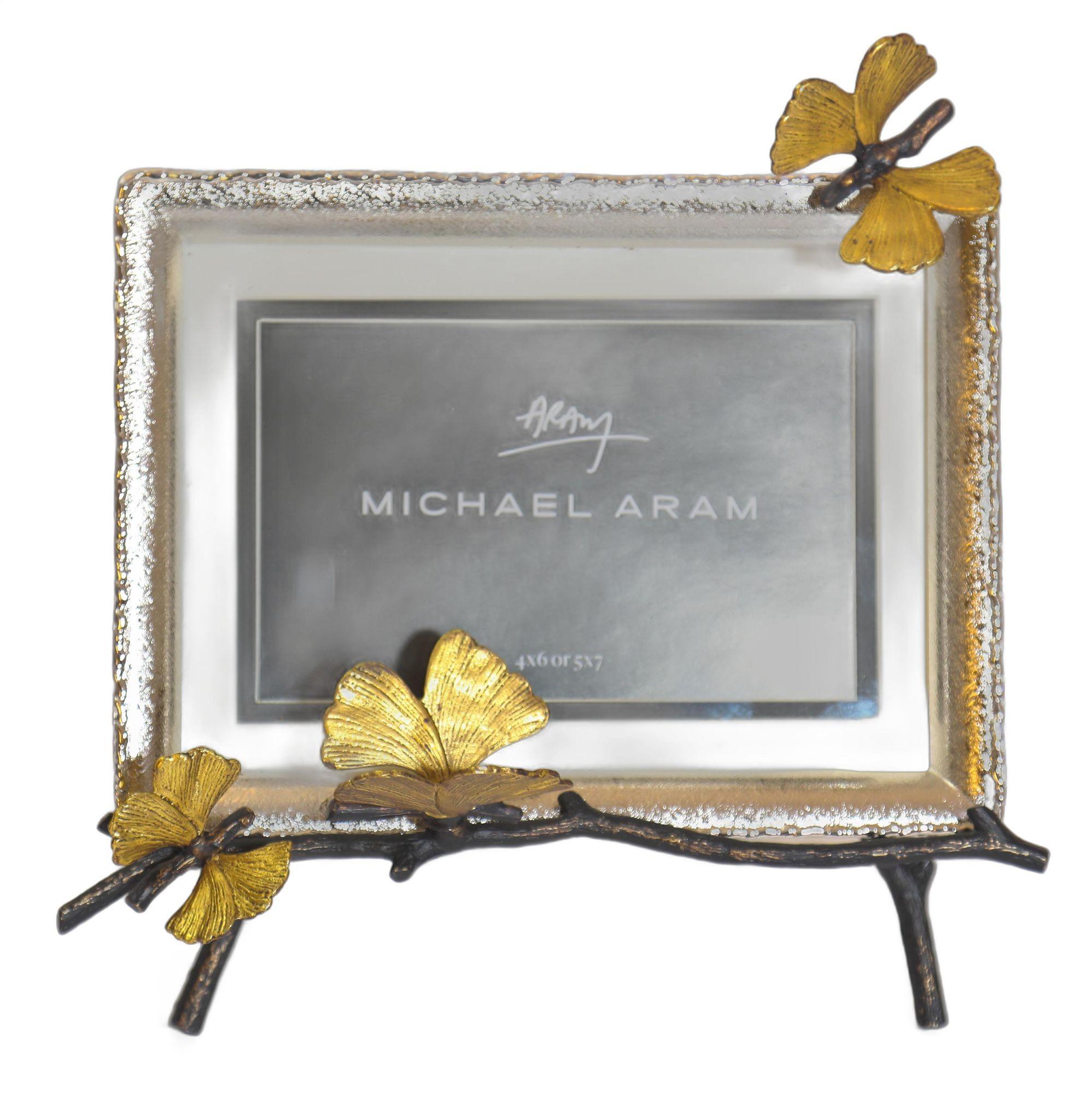 Michael Aram Butterfly Ginkgo Easel Photo Frame with original box.
The Michael Aram Butterfly Ginkgo Collection, including the photo frame, celebrates the representation of flora and fauna. Executed at the highest level of hand-craftsmanship each