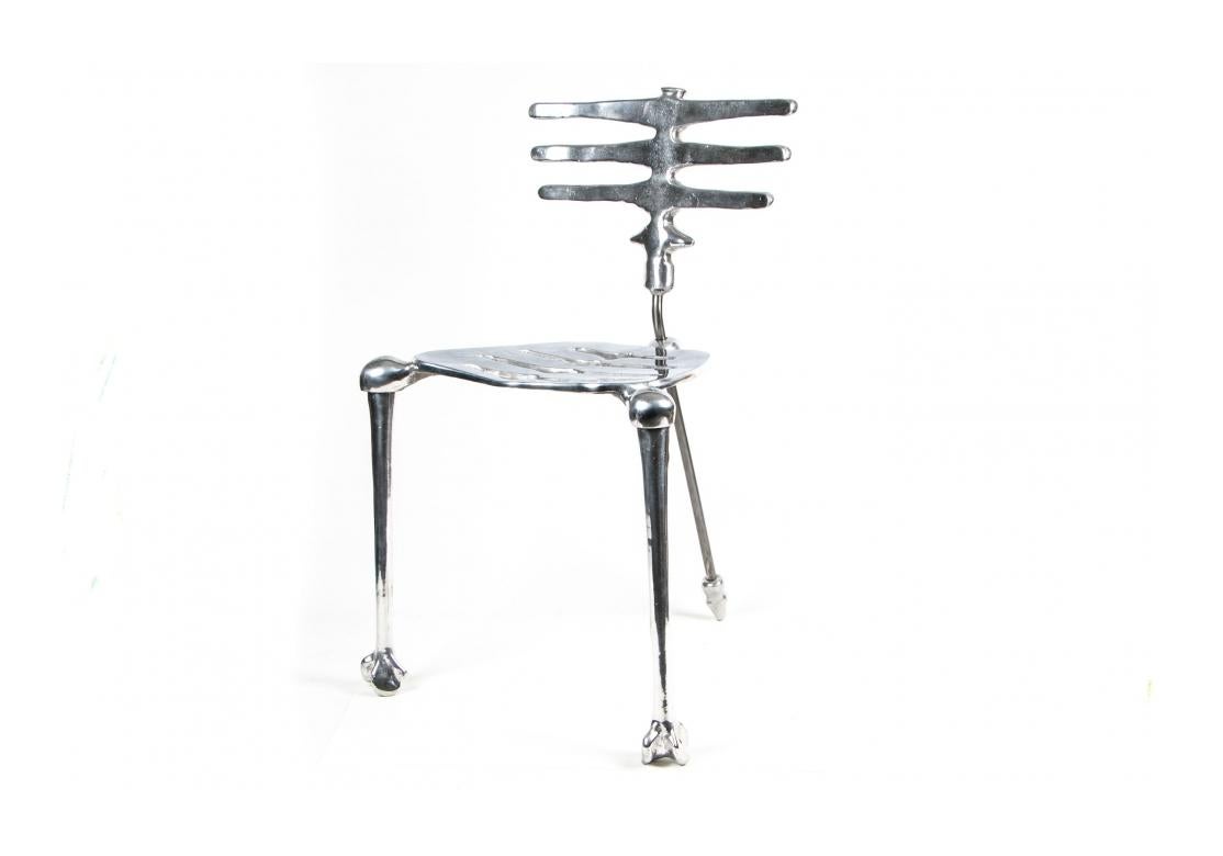 As much a piece of Sculpture as a chair, the Skeleton Chair adds Drama and an Organic Modern vibe wherever you may choose to use it.  Aram's iconic chair in cast aluminum. Signed. Surprisingly comfortable and solid feeling. 
H. 32