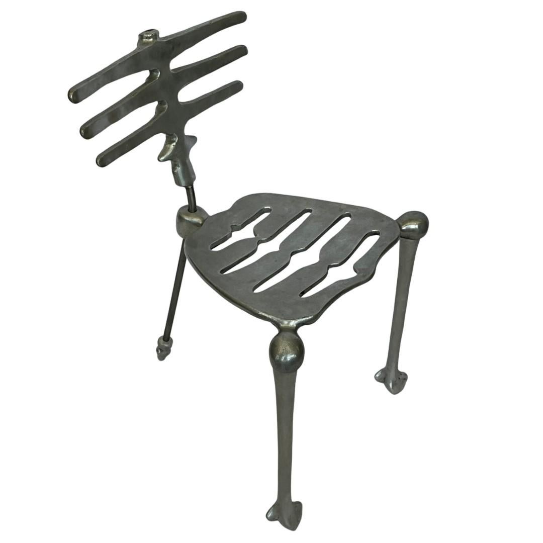 Michael Aram

Early Production Signed Skeleton Chair

This item was purchased new in New York City in 1999 & has had just one Owner

Made of Aluminum with a Steel Support Leg in the Back

In overall very good condition

     Width: 19