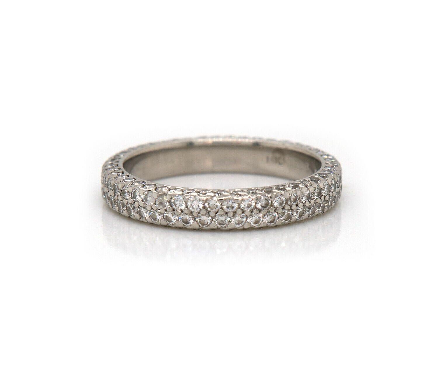 Michael B. Pave Diamond Flat Band Ring in Platinum

Michael B. Pave Diamond Flat Band ring
.950 Platinum
Diamonds Carat Weight: Approx. 0.85ctw
Band Width: Approx. 3.4 MM
Ring Size: 6.25 (US)
Weight: Approx. 5.40 Grams
Stamped: MICHAEL B.,