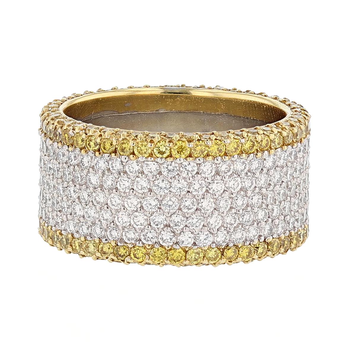This ring is made in Platinum and 18K yellow gold and features 180 round cut Fancy Yellow Diamonds weighing 1.36ct and 225 round cut White Diamonds weighing 2.11ct.
