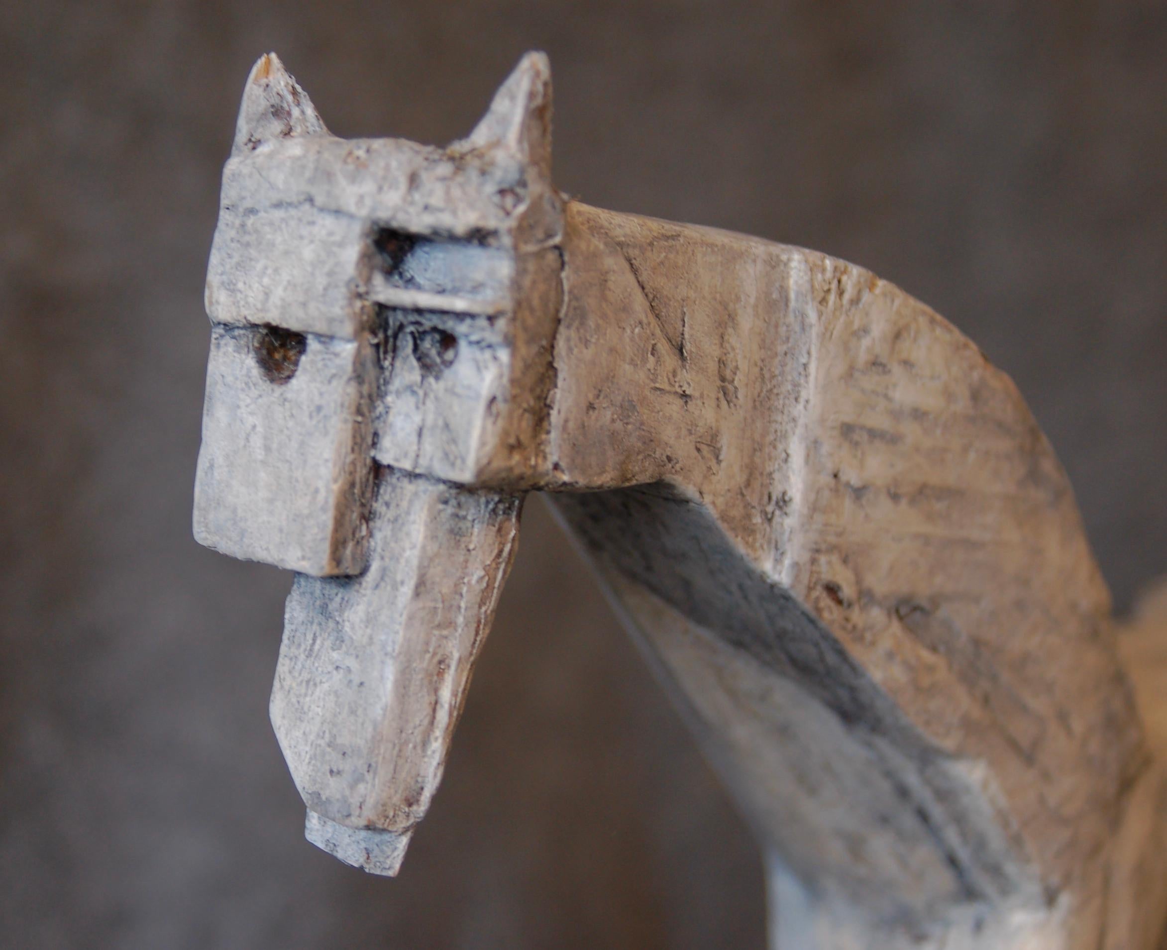 The Gray Pony is an abstract Cubist sculpture of a horse. Made primarily from wooden sticks of various sizes and textures, The Gray Pony is sealed with wax and putty, painted with acrylic paint and finished with a coat of polyurethane. 

I created