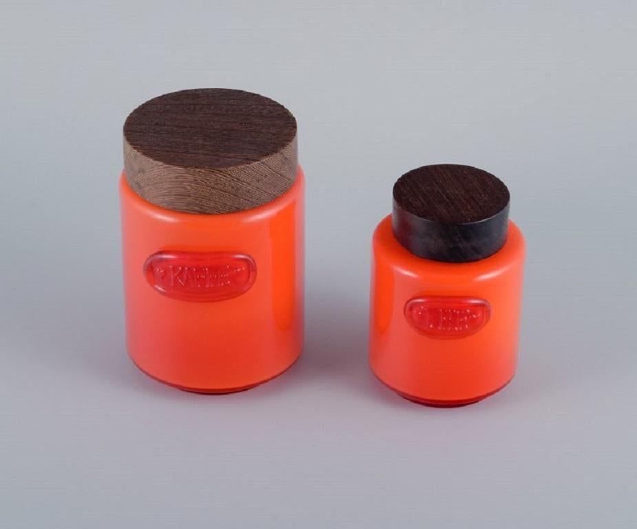 Michael Bang for Holmegaard.
Coffee and tea art glass caddy in orange and white with wooden lids.
1960s.
In perfect condition.
Coffee: H 14.0 x D 10.0 cm.
Tea: H 11.5 x D 8.0 cm.