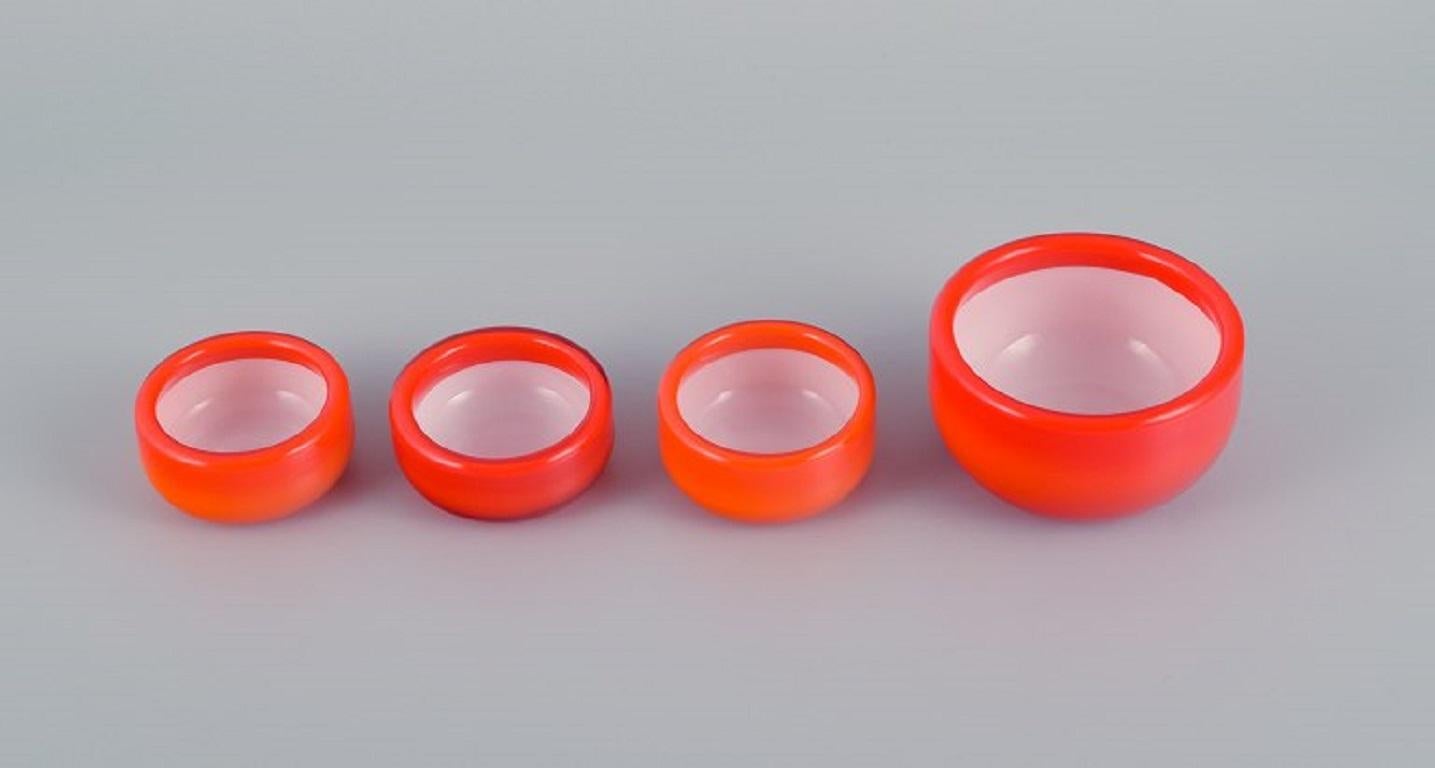 Michael Bang for Holmegaard.
Four glass bowls in orange and white art glass.
1960s.
In perfect condition.
Dimensions: D 9.0 x H 5.5 cm.
Dimensions: D 6.5 x H 3.5 cm.