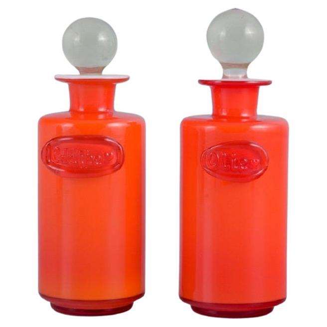 Michael Bang for Holmegaard. Oil and Vinegar Containers in Art Glass For Sale