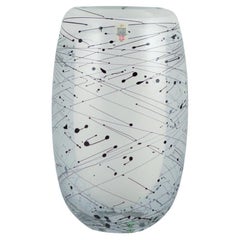 Michael Bang for Holmegaard. Unique art glass vase. White glass on the inside.