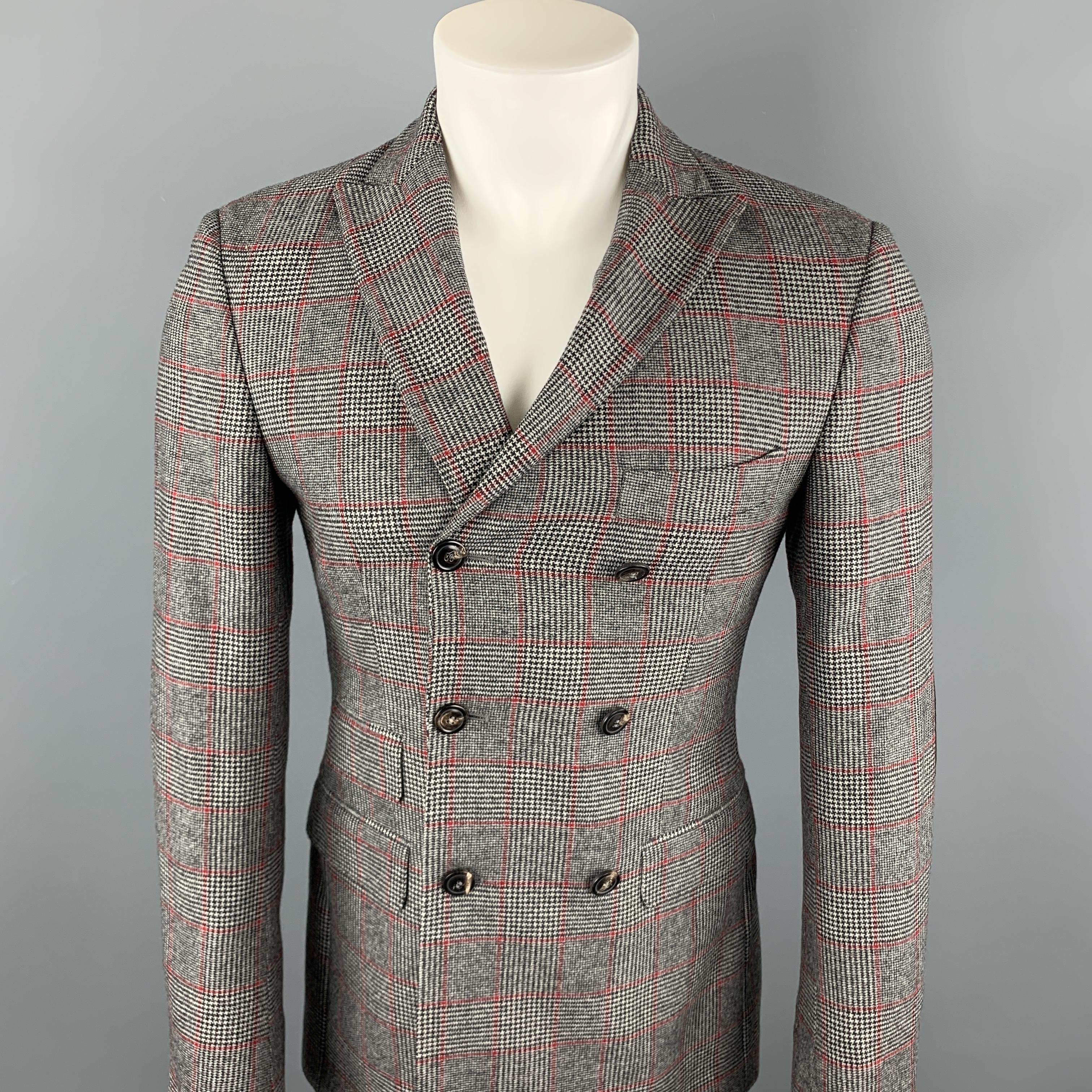 MICHAEL BASTIAN sport coat comes in a black & white plaid wool featuring a peak lapel style, suede elbow patches, flap pockets, and a double breasted closure. Made in Italy.

Excellent Pre-Owned Condition.
Marked: 46

Measurements:

Shoulder: 18 in.