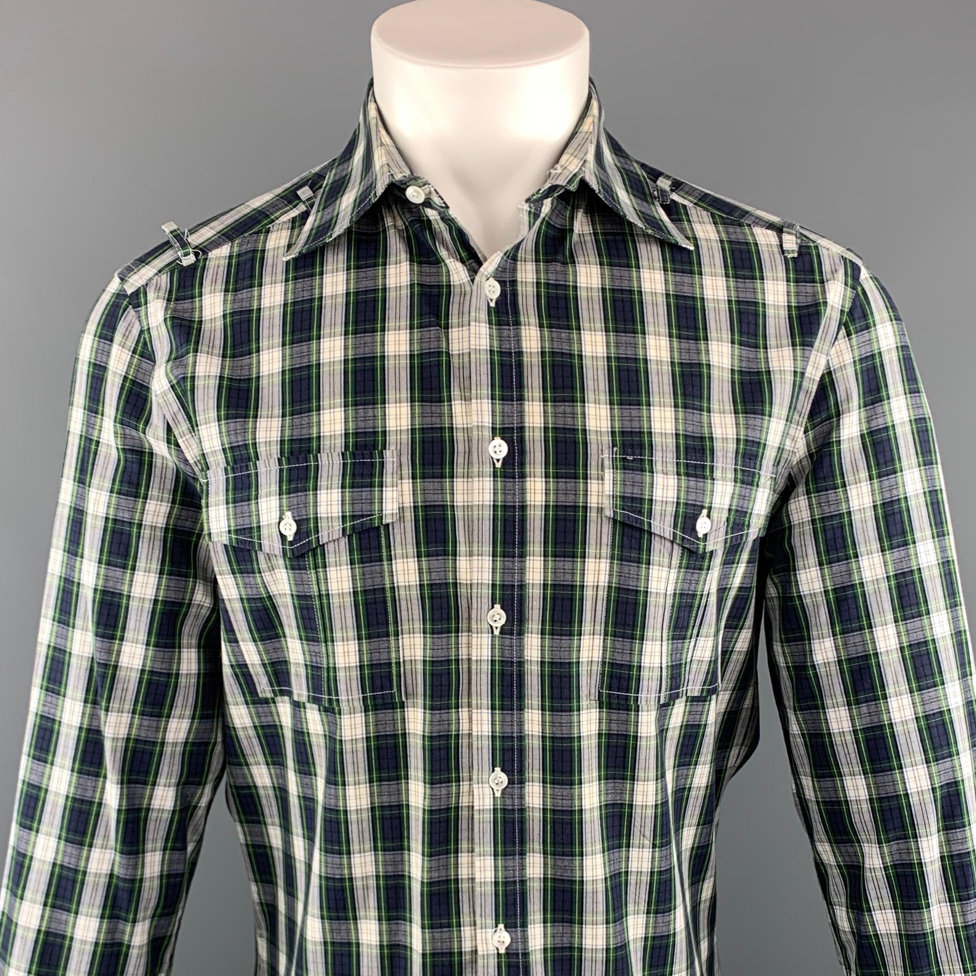 MICHAEL BASTIAN long sleeve shirt comes in a navy and white plaid cotton featuring a button up style, shoulder loop details, and front patch pockets. Made in Italy.
 
Excellent Pre-Owned Condition.
Marked: 40
 
Measurements:
 
Shoulder: 17.5