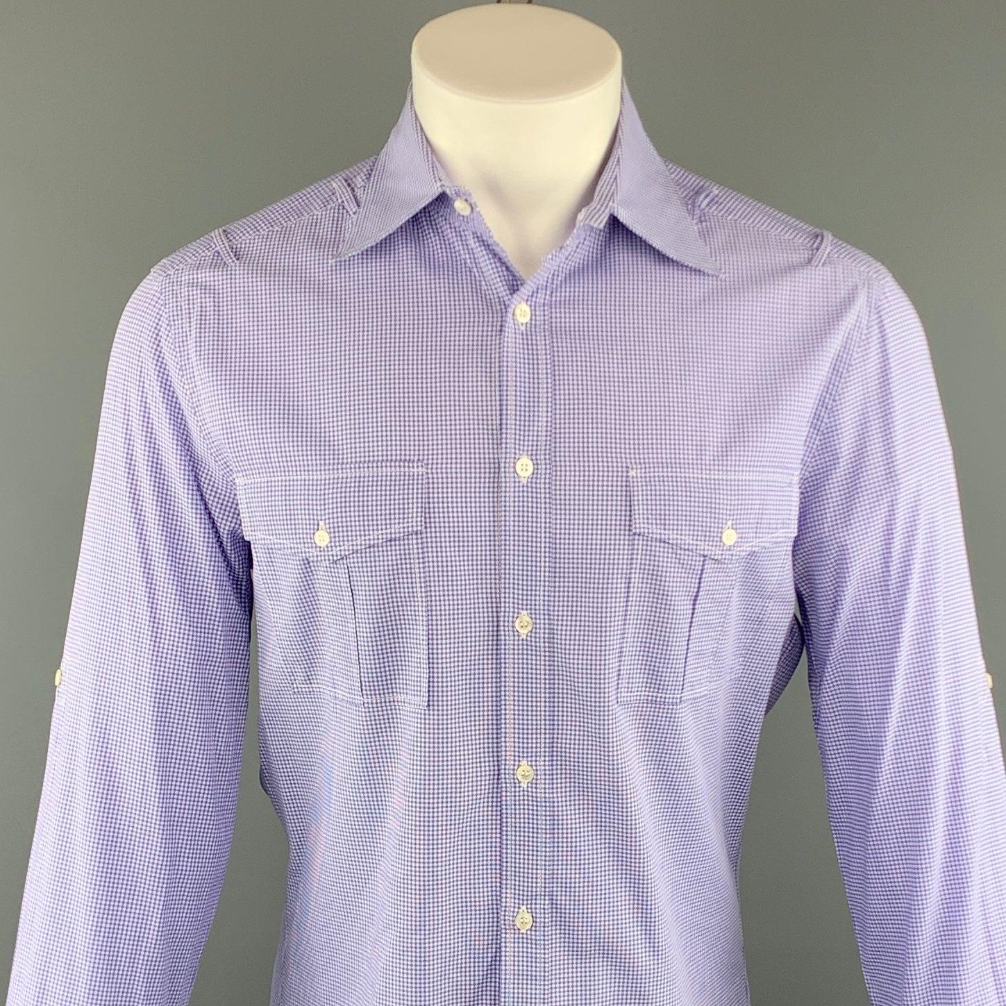 MICHAEL BASTIAN long sleeve shirt comes in a purple checkered cotton featuring a button up style, shoulder loop details, and front patch pockets. Made in Italy.
Excellent Pre-Owned Condition.
 

Marked:   40	
 

Measurements: 
  
l	Shoulder: 17.5