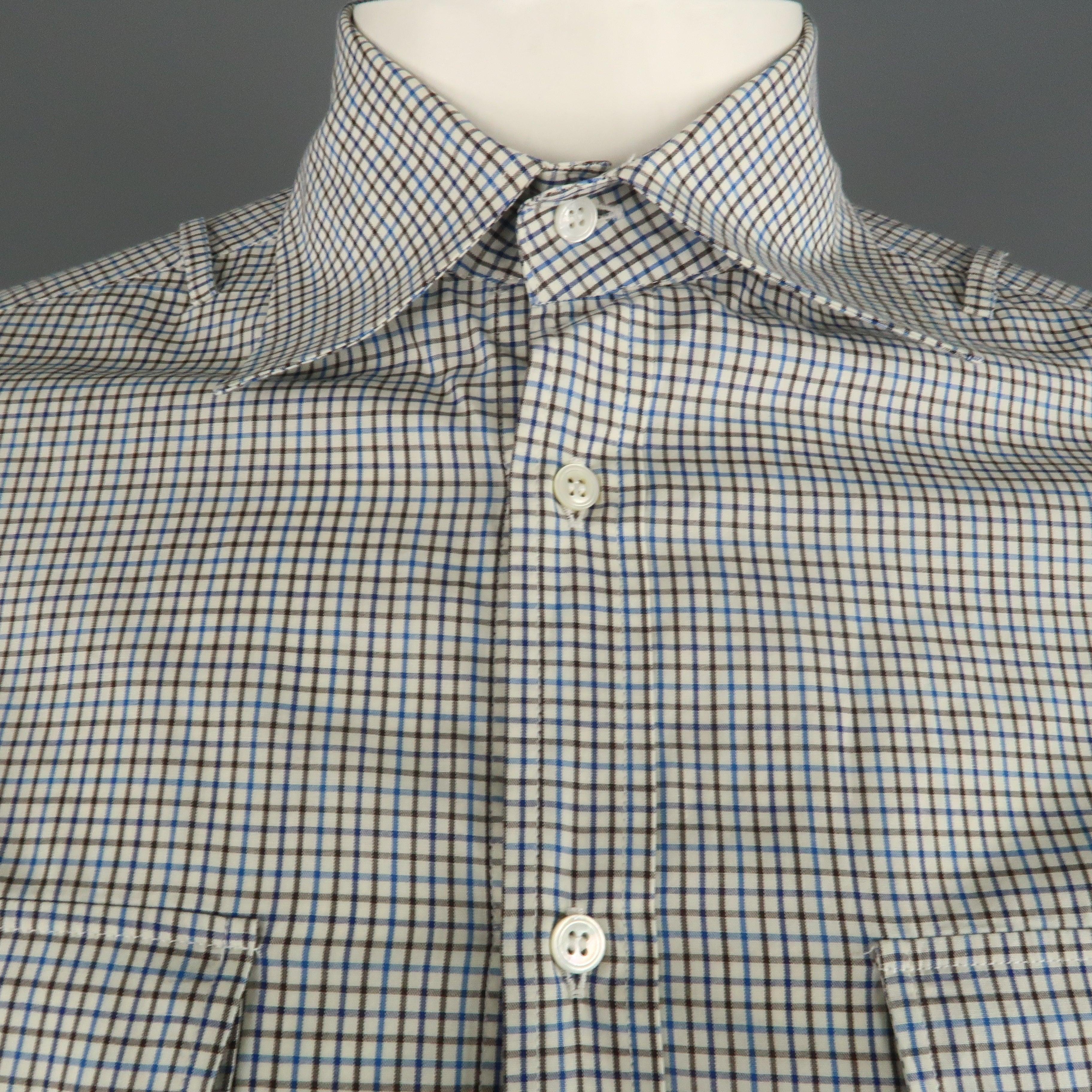 MICHAEL BASTIAN lone sleeve shirt comes in a blue and brown plaid featuring a spread collar and front patch pockets. Made in Italy
Excellent Pre-Owned Condition.
 

Marked:   39/15.5 
 

Measurements: 
  
l	Shoulder: 18.5 inches  
l	Chest: 40 inches