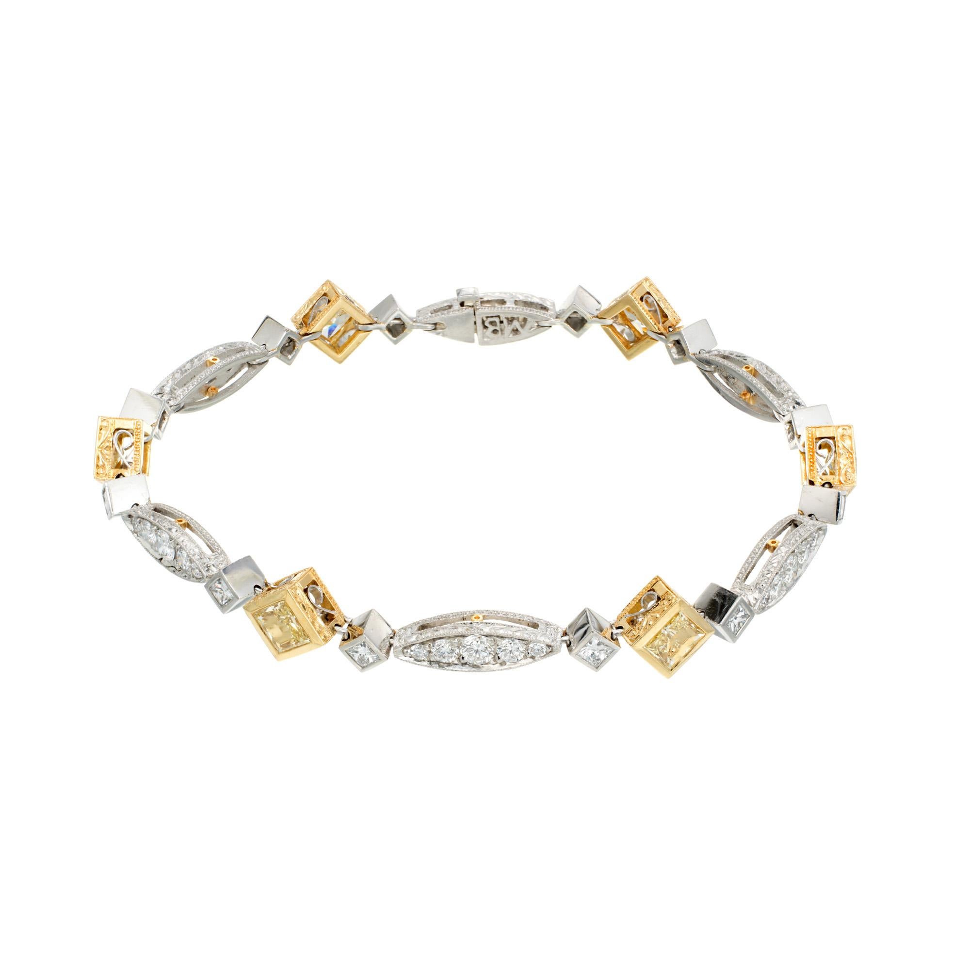 Michael Beaudry yellow and white diamond bracelet. 12 princess cut tube bezel set diamonds set in Platinum tubes accented with 6 radiant cut natural fancy yellow diamonds set in 18k yellow gold frames. 30 round cut diamonds of varying sizes finish