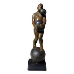 Statue en bronze coulé de Michael Bergt "On a Roll" sur socle en bois