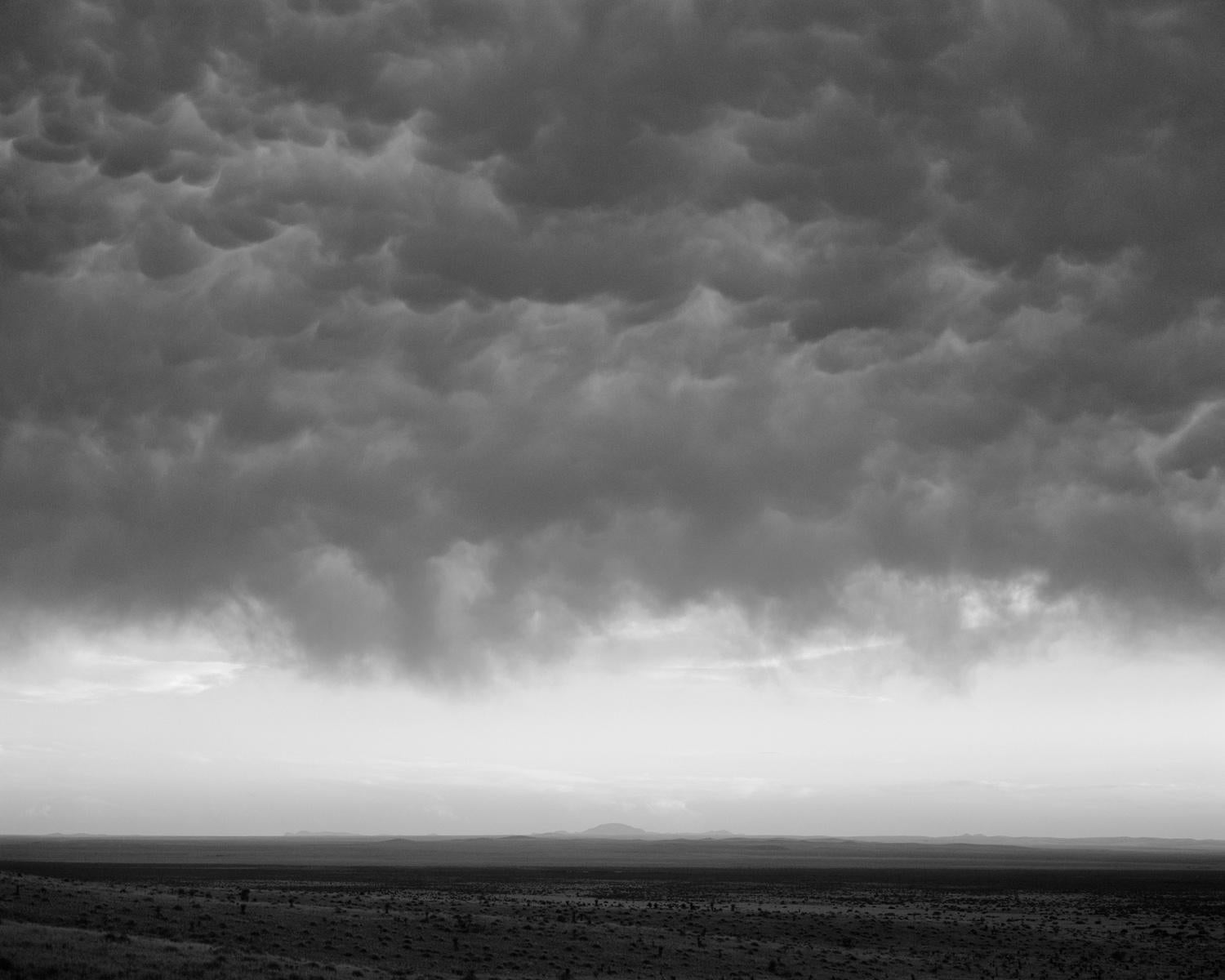 Michael Berman. Storm. Chinati Grasslands. Marfa, TX, 2009 (08s.054 Clouds). Archival pigment ink print. Image Size: 20x25".  Edition of 12. Signed, dated, titled, and editioned on print verso. Signed, dated, and editioned on print recto. 