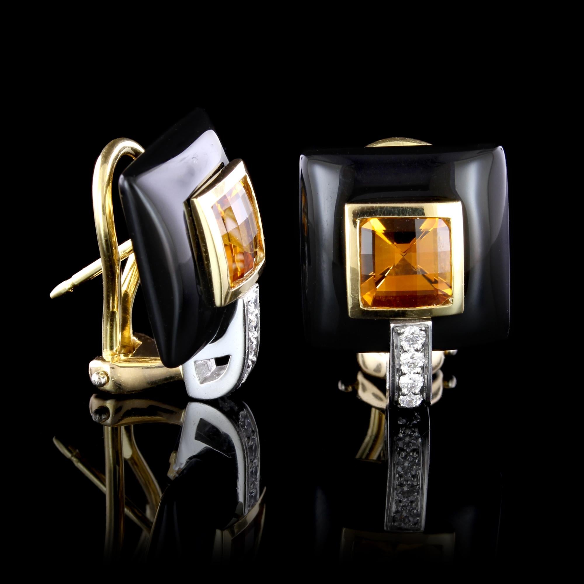 Michael Bondanza 18K Yellow Gold, Platinum Onyx, Citrine and Diamond Earrings. The earrings are set with two square cut citrines, framed by black onyx, further set with ten full cut diamonds, approx. total wt. .20cts., G color, VS clarity, length