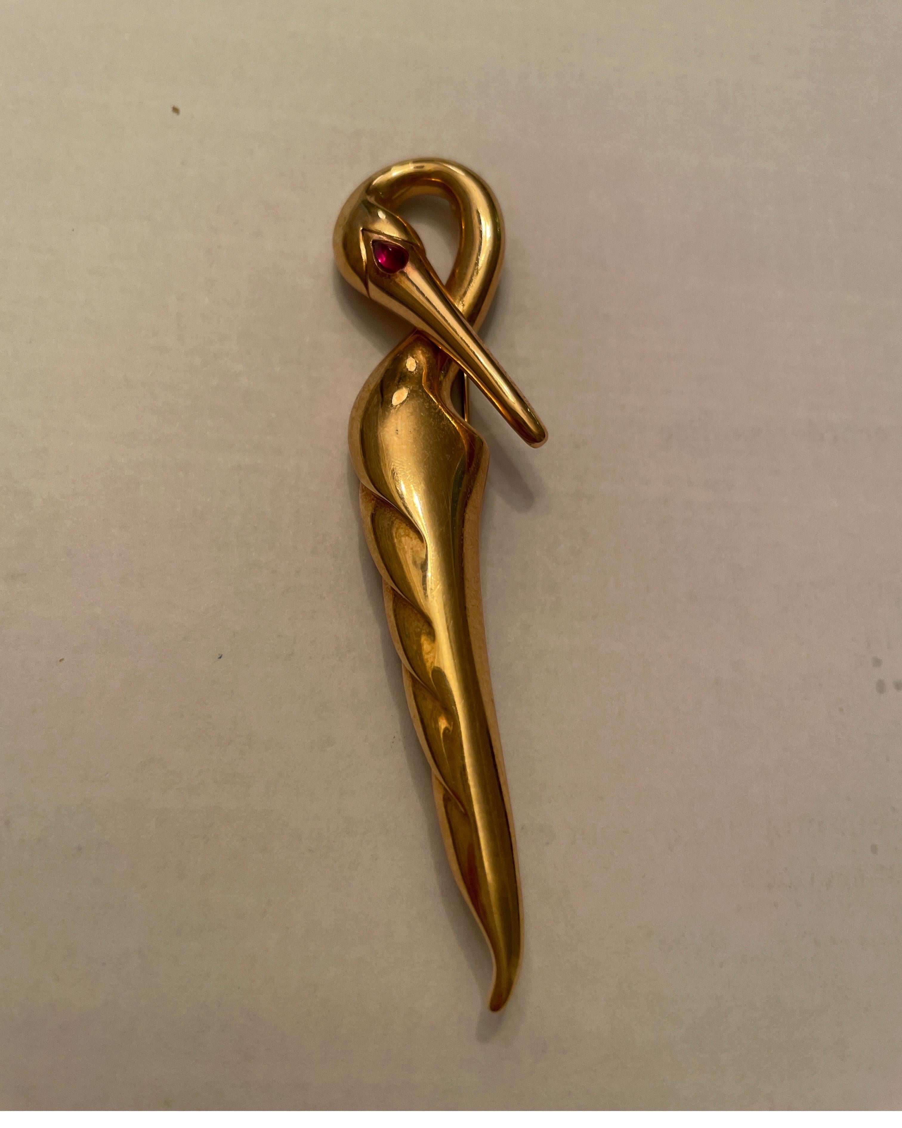 Michael Bondanza 18K yellow gold swan pin with pear shape cabochon  ruby eye. 
Last retail $3250