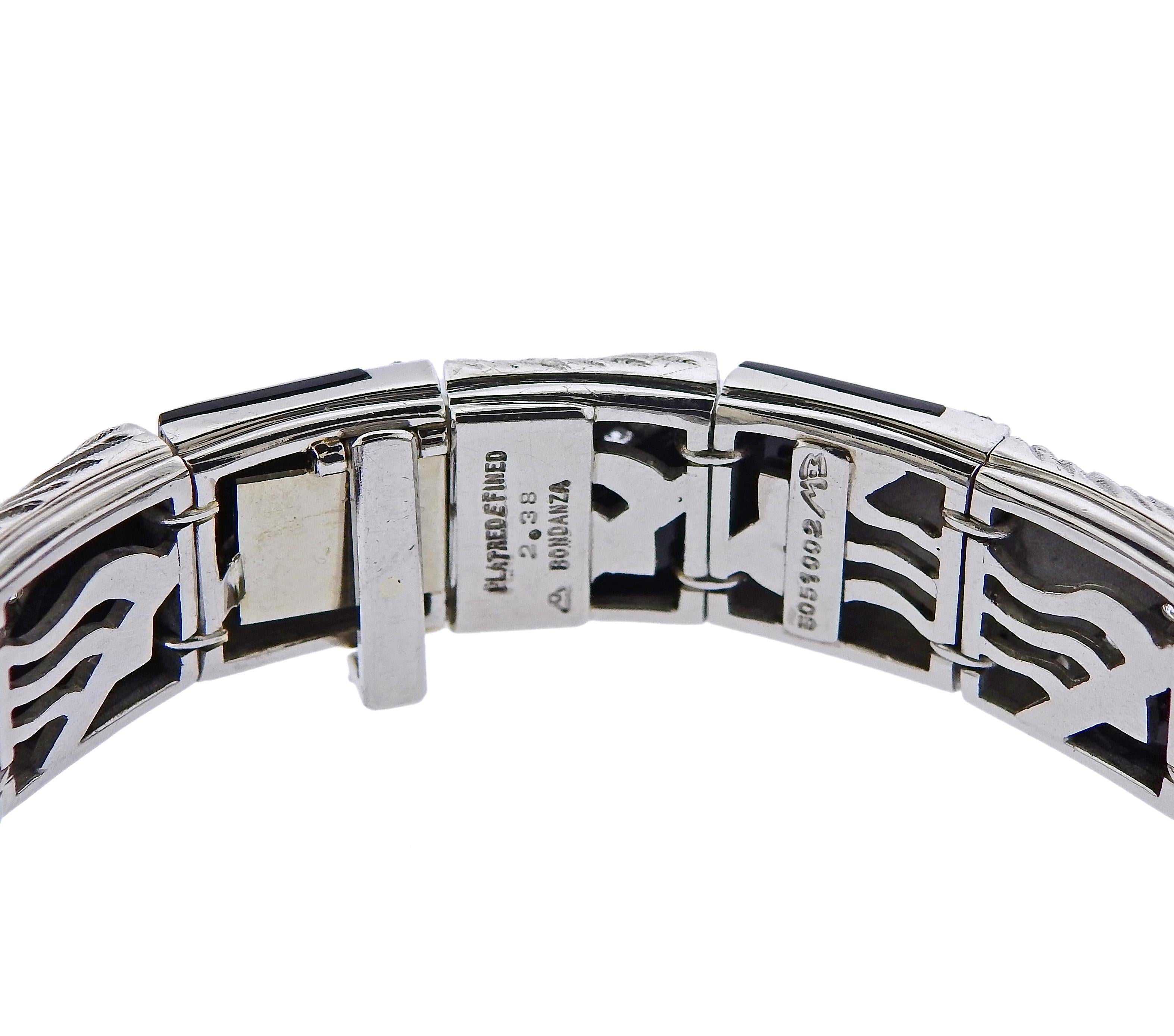 Impressive platinum bracelet by Michael Bondanza, set with onyx and 2.38ctw in G/VS diamonds.   Bracelet is 7