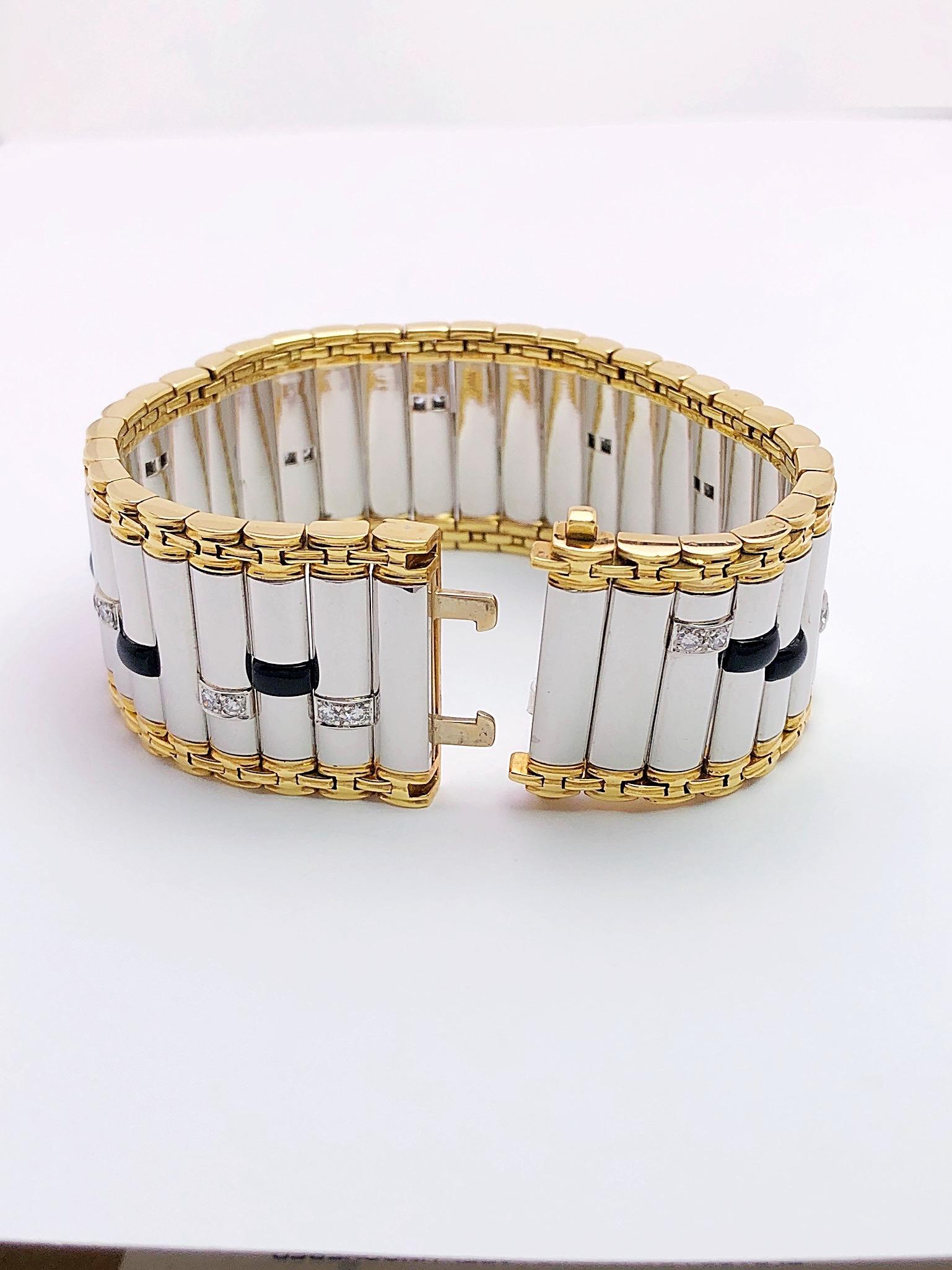 This platinum and 18 karat bracelet is an iconic representation of the artist, Michael Bondanza, world renowned  for his work in precious metals. Each Michael Bondanza piece is expertly hand crafted in the heart of New York City. 35 hand made links