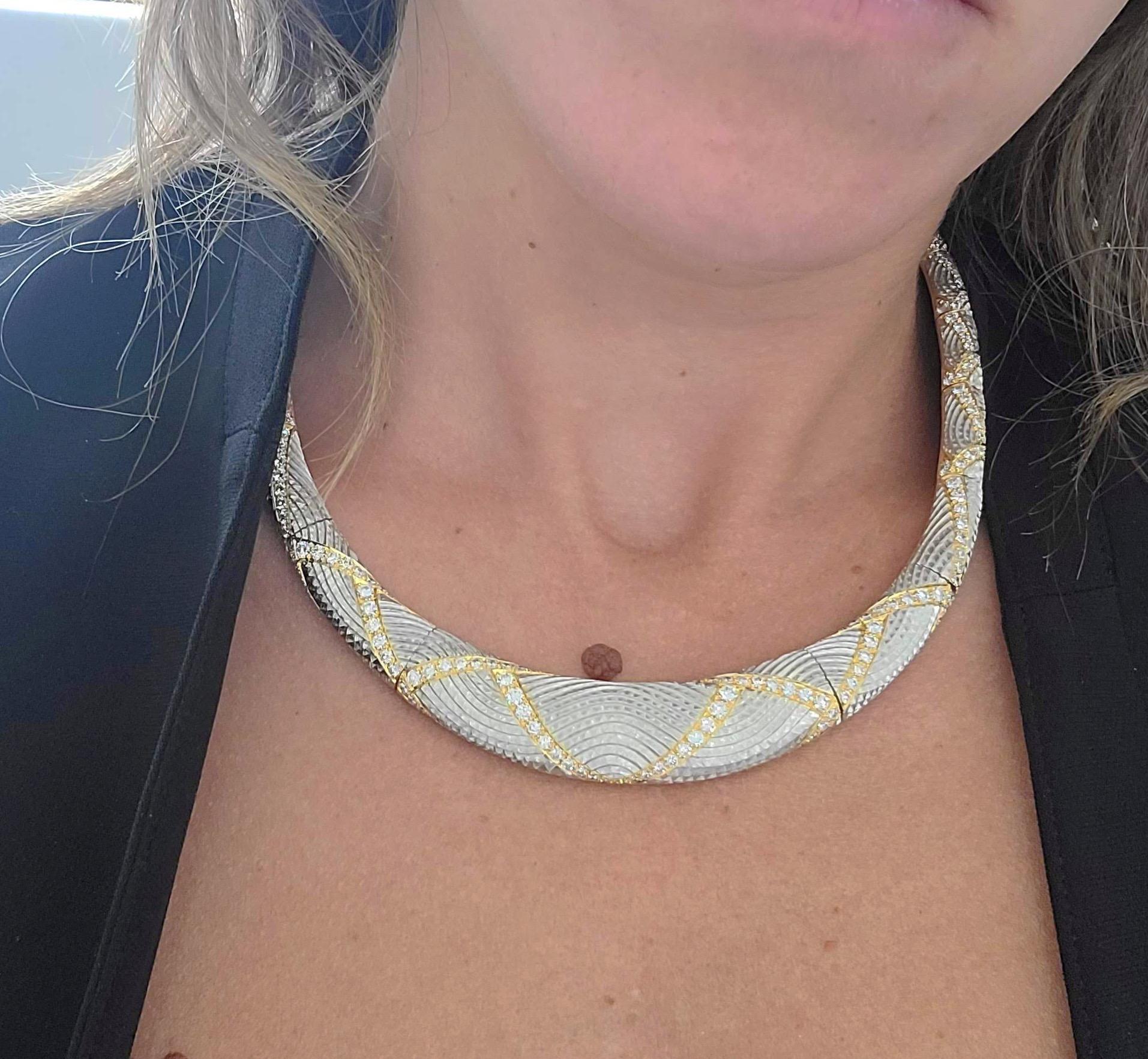 This platinum and 18 karat yellow gold collar necklace is an iconic representation of the artist, Michael Bondanza, world renowned for his work in precious metals. Each Michael Bondanza piece is expertly hand crafted in the heart of New York City.