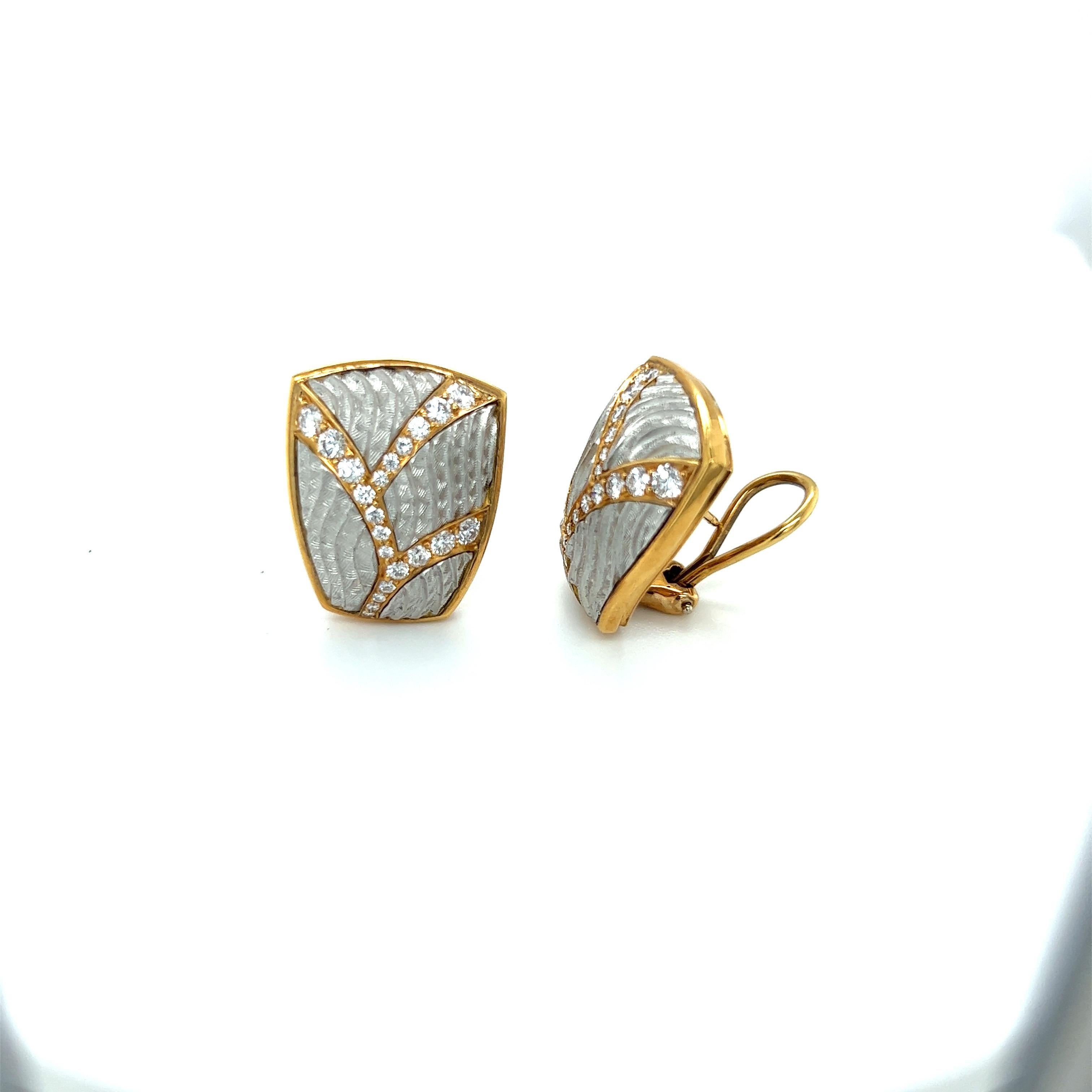 These 18kt and Platinum earrings are an iconic representation of the artist, Michael Bondanza, world renowned  for his work in precious metals. Each Michael Bondanza piece is expertly hand crafted in the heart of New York City. 
These magnificent