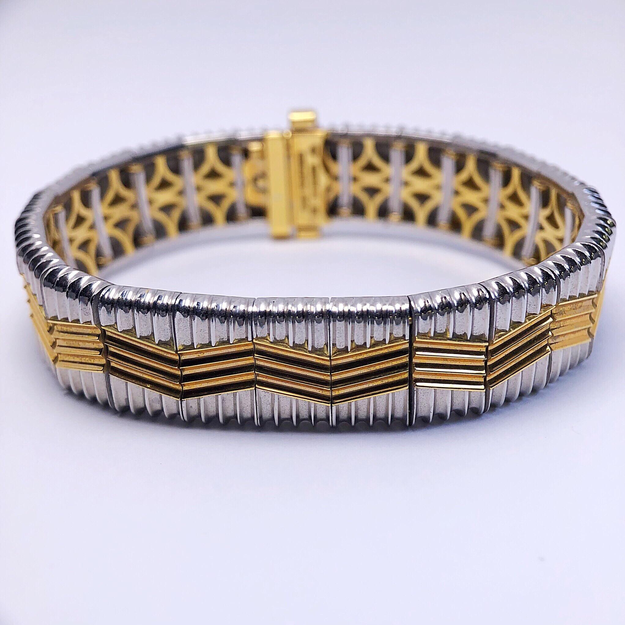 This 18kt and Platinum bracelet is an iconic representation of the artist, Michael Bondanza, world renowned work in precious metals. Each Michael Bondanza piece is expertly hand crafted in the heart of New York City. 24 hand made links comprised of
