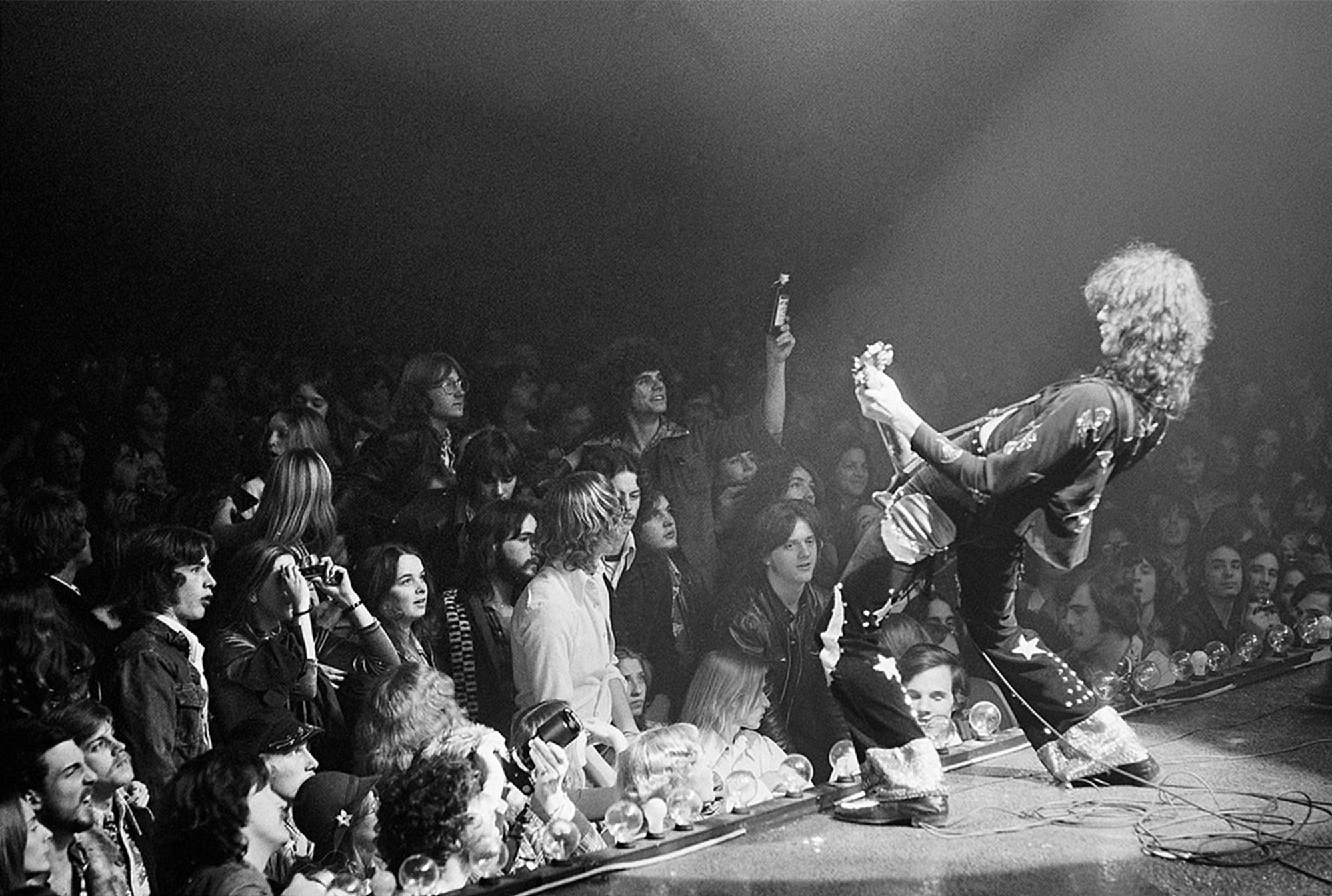 Michael Brennan Black and White Photograph - Jimmy Page Led Zeppelin live on stage 1975