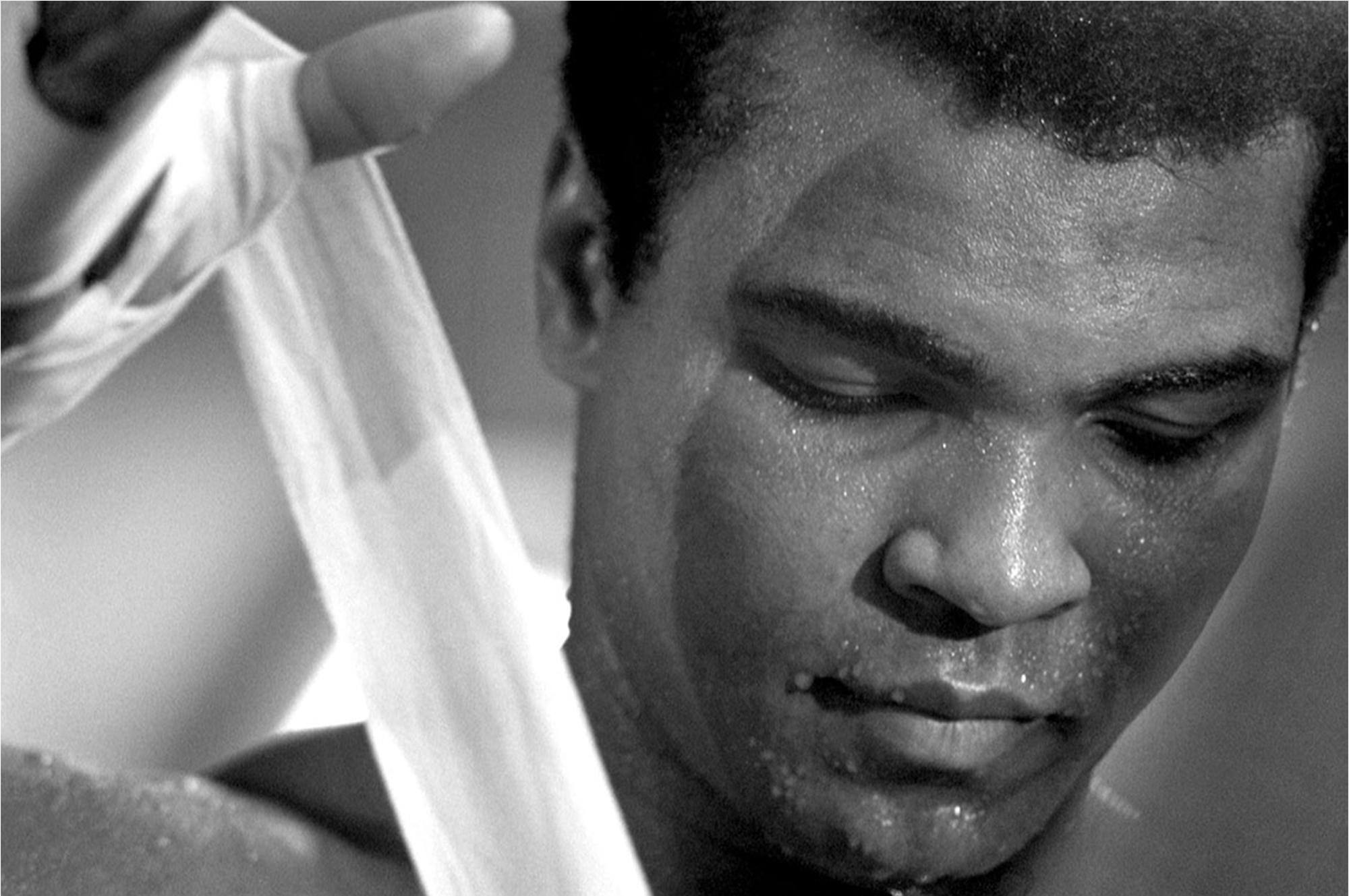 Michael Brennan Black and White Photograph - Muhammad Ali Taping Fists