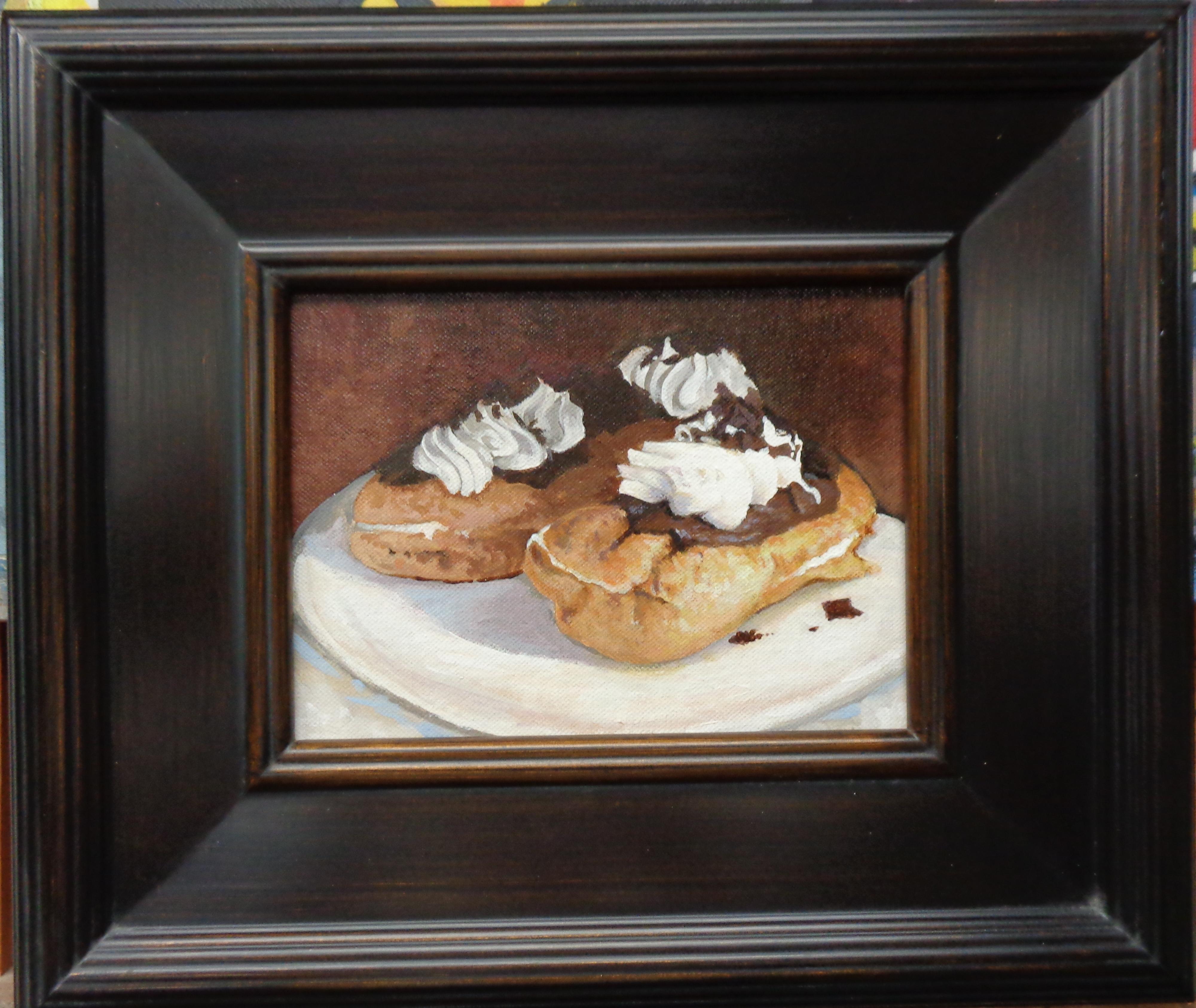 An oil painting on canvas by award winning contemporary artist Michael Budden that showcases a pair of eclairs. Image is 6 x 8 unframed.
ARTIST'S STATEMENT
I have been in the art business as an artist and dealer since the early 80's. Almost 40 years