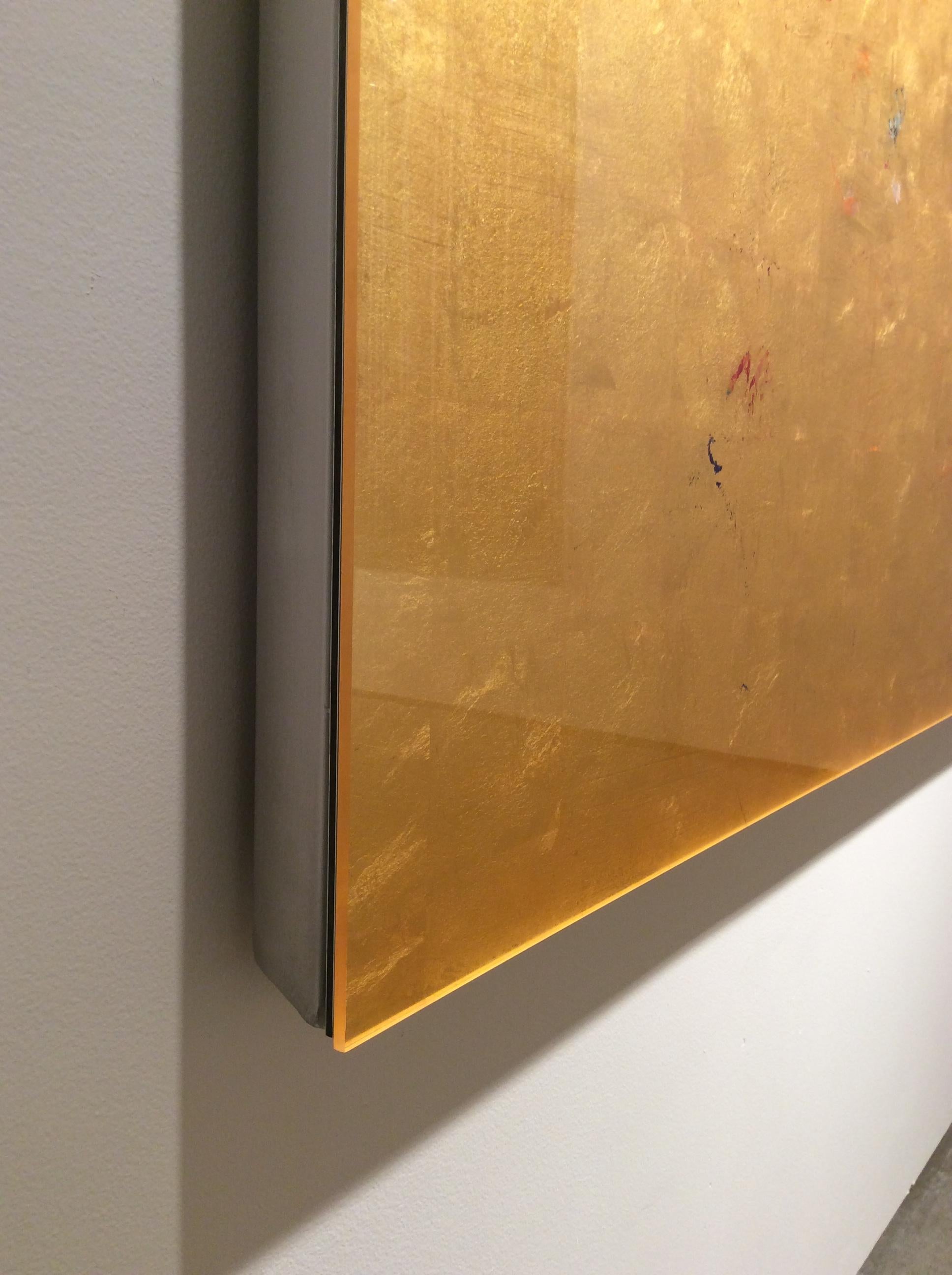 An elegant, behind-glass painting with fine line details in multi-colours on 23,75 ct. gold leaf. Mounted on a deep, aluminum frame. 
Michael Burges explores methods in abstract painting, via his use of oils and metals such as copper, silver and