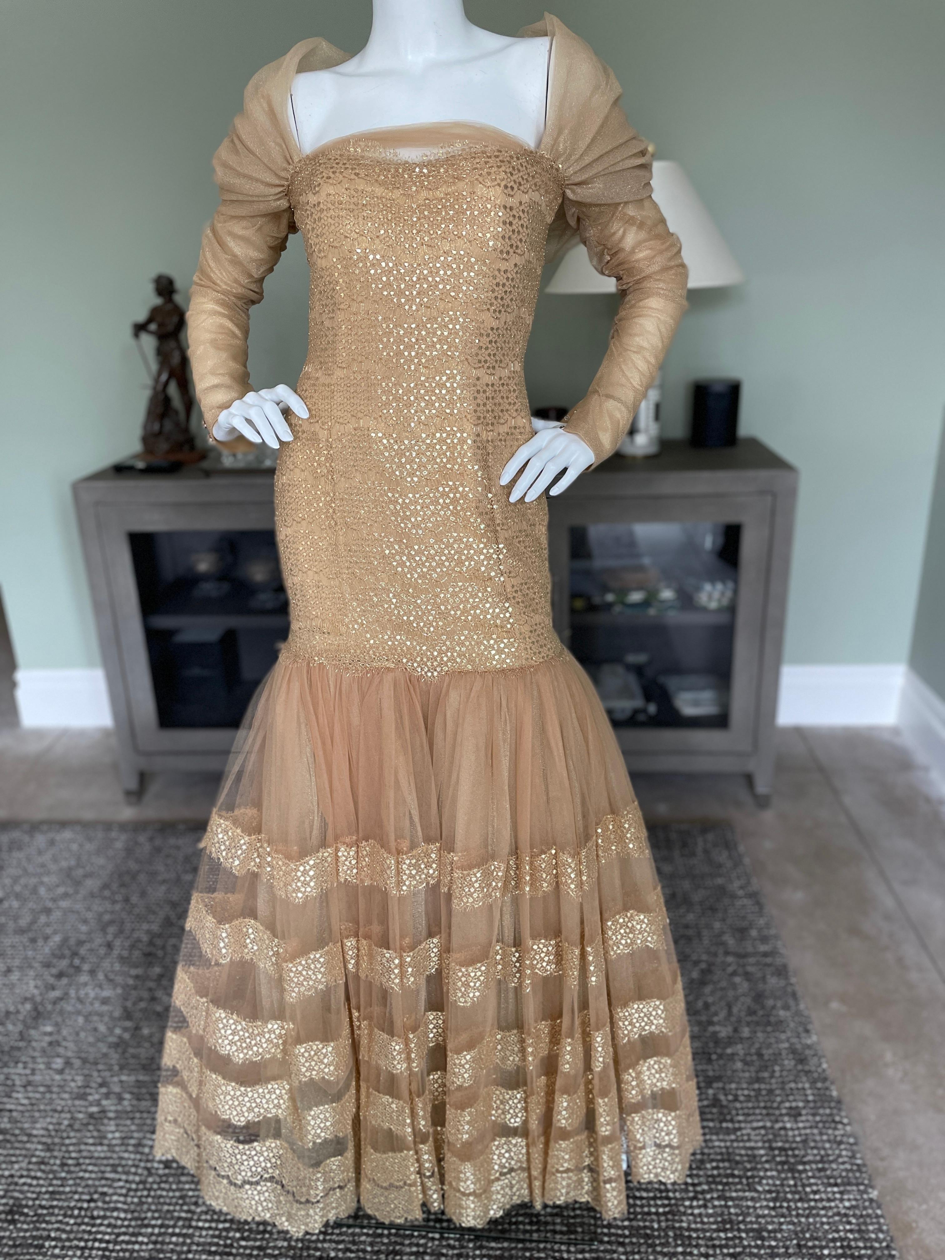Michael Casey Couture 1980's Exquisite Gold Mermaid Ball Gown
So pretty, this has very wide mermaid flounce with yards of fabric, shimmers and shines when you walk.
Great entrance maker.
Provenance ; Charlotte Shultz , wife of former US Secretary of
