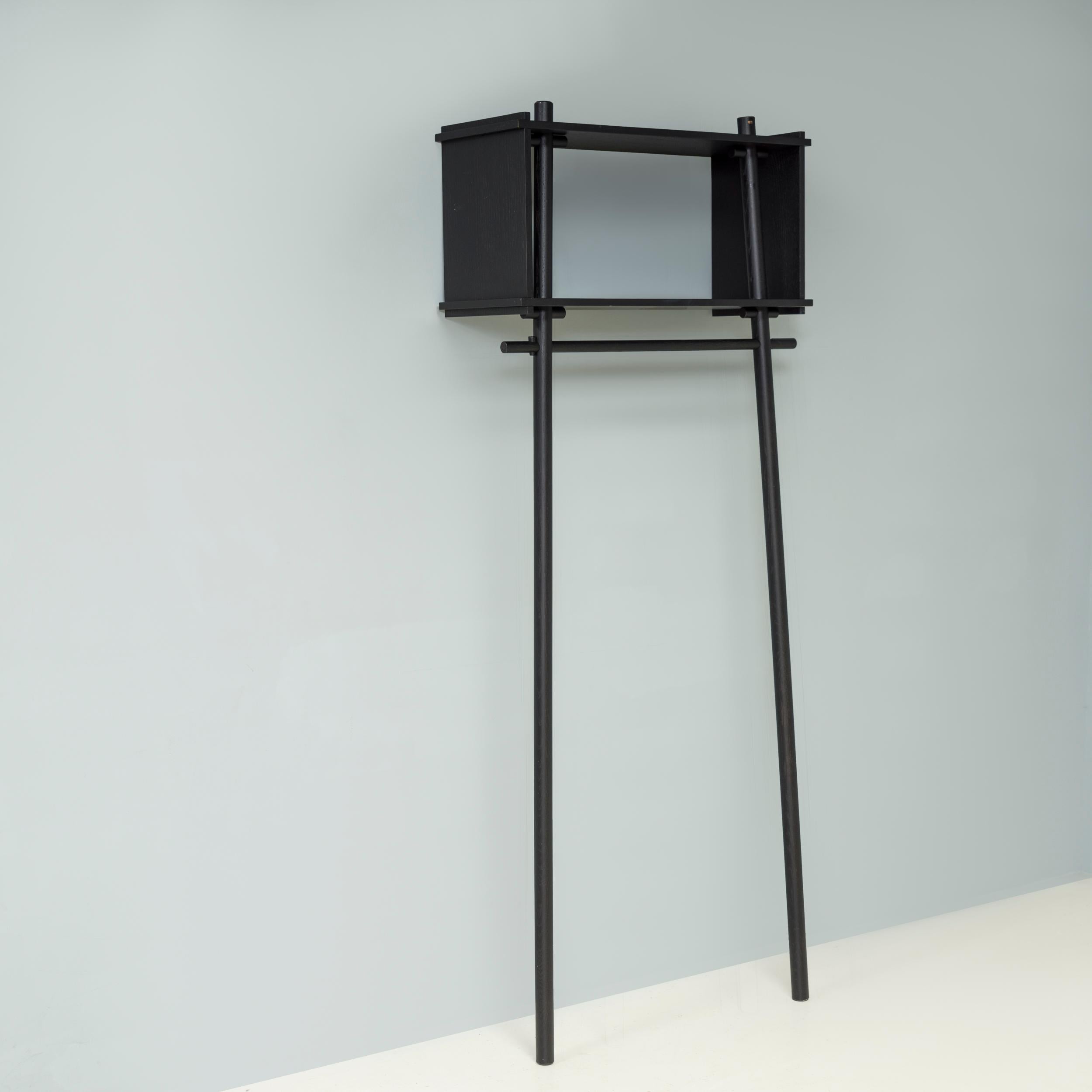 Designed by Michael Daae Christensen of Made by Michael and manufactured by Woud, the Töjbox coat rack is a fantastic example of contemporary Scandinavian design.

Constructed from black oak using traditional joinery techniques, the coat rack has no