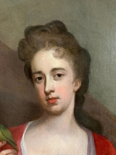 A portrait of a lady and her daughter with an exotic bird