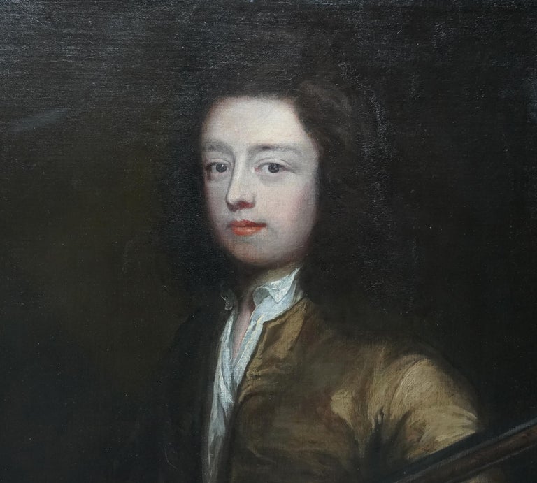 This stunning 18th century Old Master portrait oil painting is attributed to Swedish born, England based artist Michael Dahl. Painted circa 1690 it is a sumptuous half length portrait of a dark haired gentleman dressed in rich bronze coloured satin