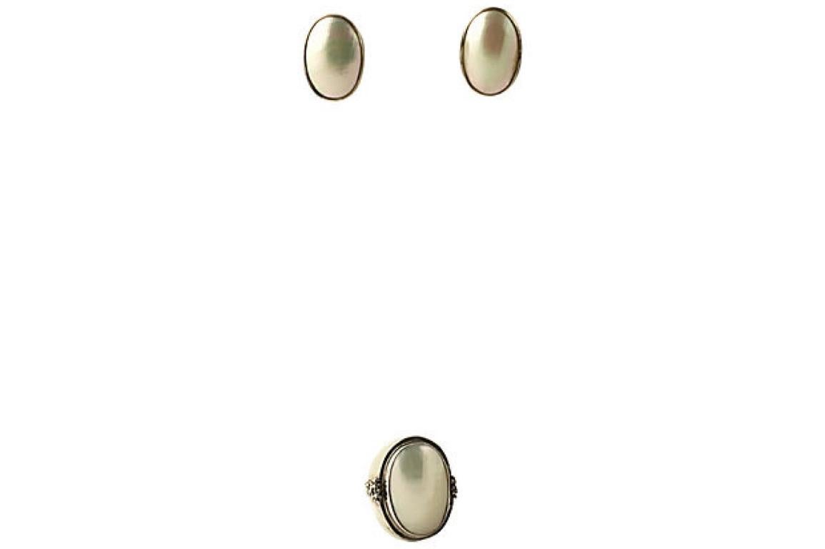 Sterling silver and mabe pearl suite by Michael Dawkins. Oval earrings feature bezel-set mabe pearl centers and omega back closures.   Earrings, 0.88