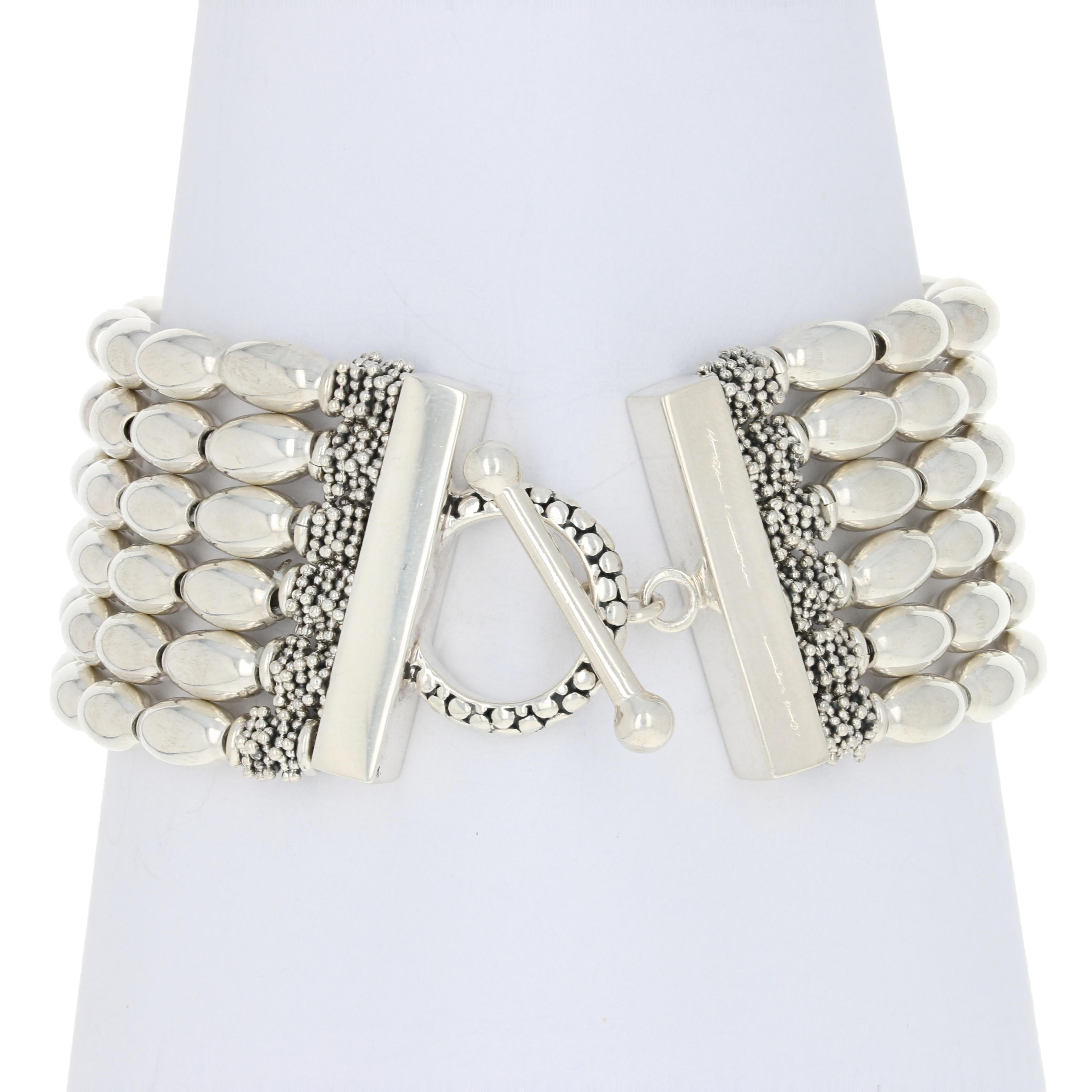 Brand: Michael Dawkins
 
 Metal Content: Guaranteed Sterling Silver as stamped
 Bracelet Style: Beaded Six-Strand
 Measurements: length 7