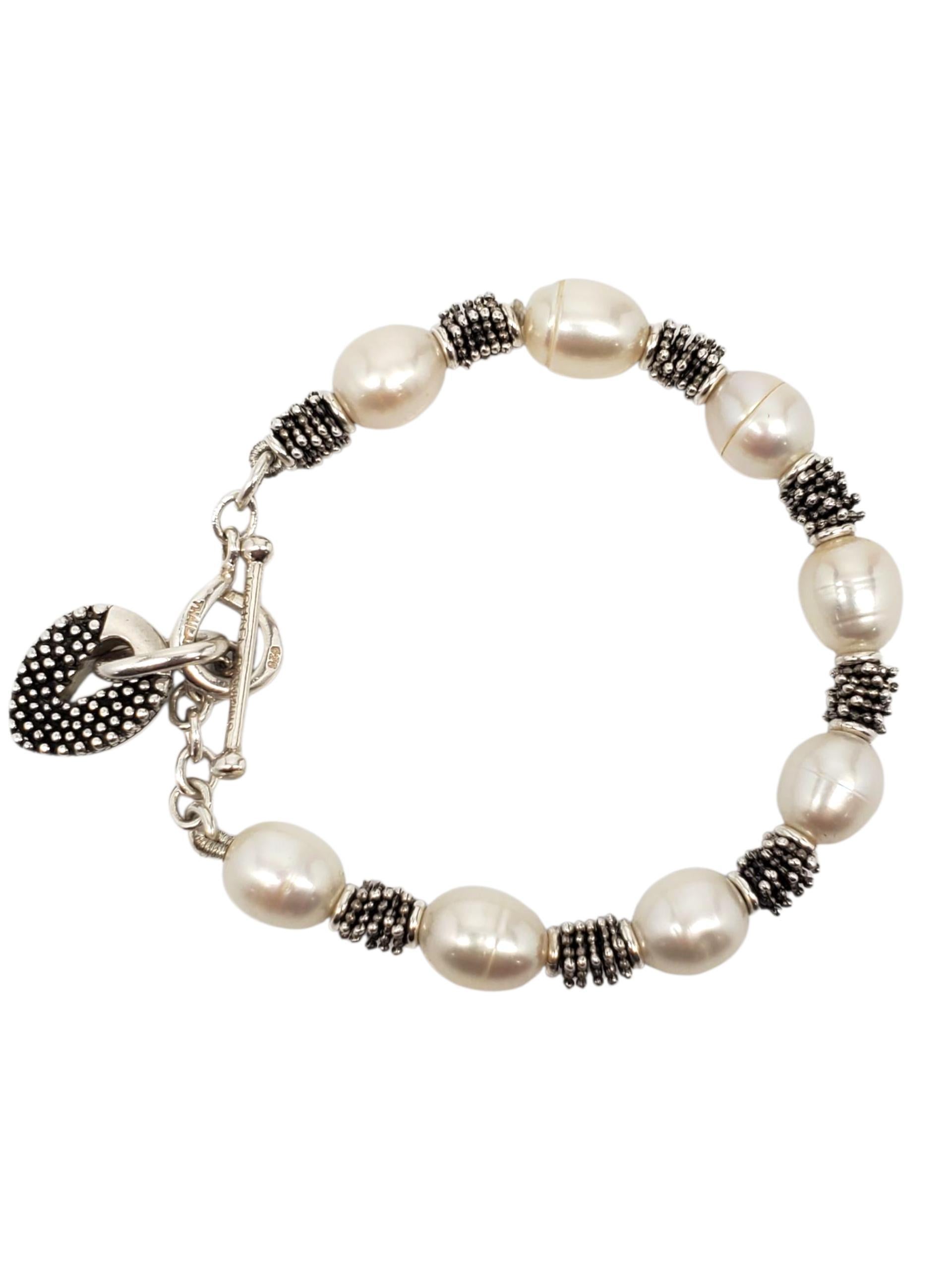 Michael Dawkins - Bracciale con perle d'acqua dolce in argento 925 -

Questo elegante braccialetto in argento di Michael Dawkins è caratterizzato da luminose perle d'acqua dolce con distanziatori in argento e chiusura ad alamari.

Dimensioni: 6,5