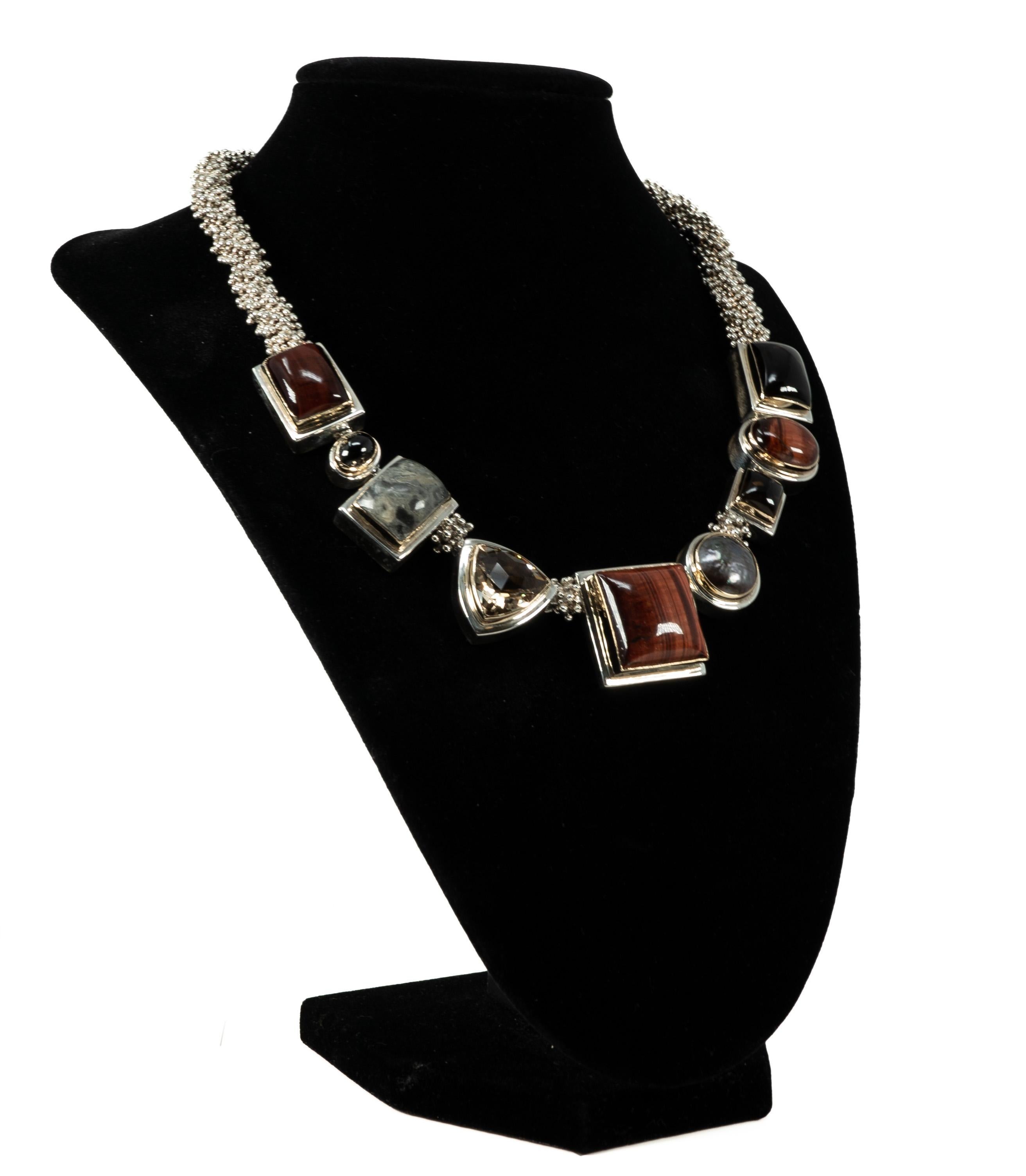 In sterling silver with various Red Tigers Eye, Quartz and hardstones.
