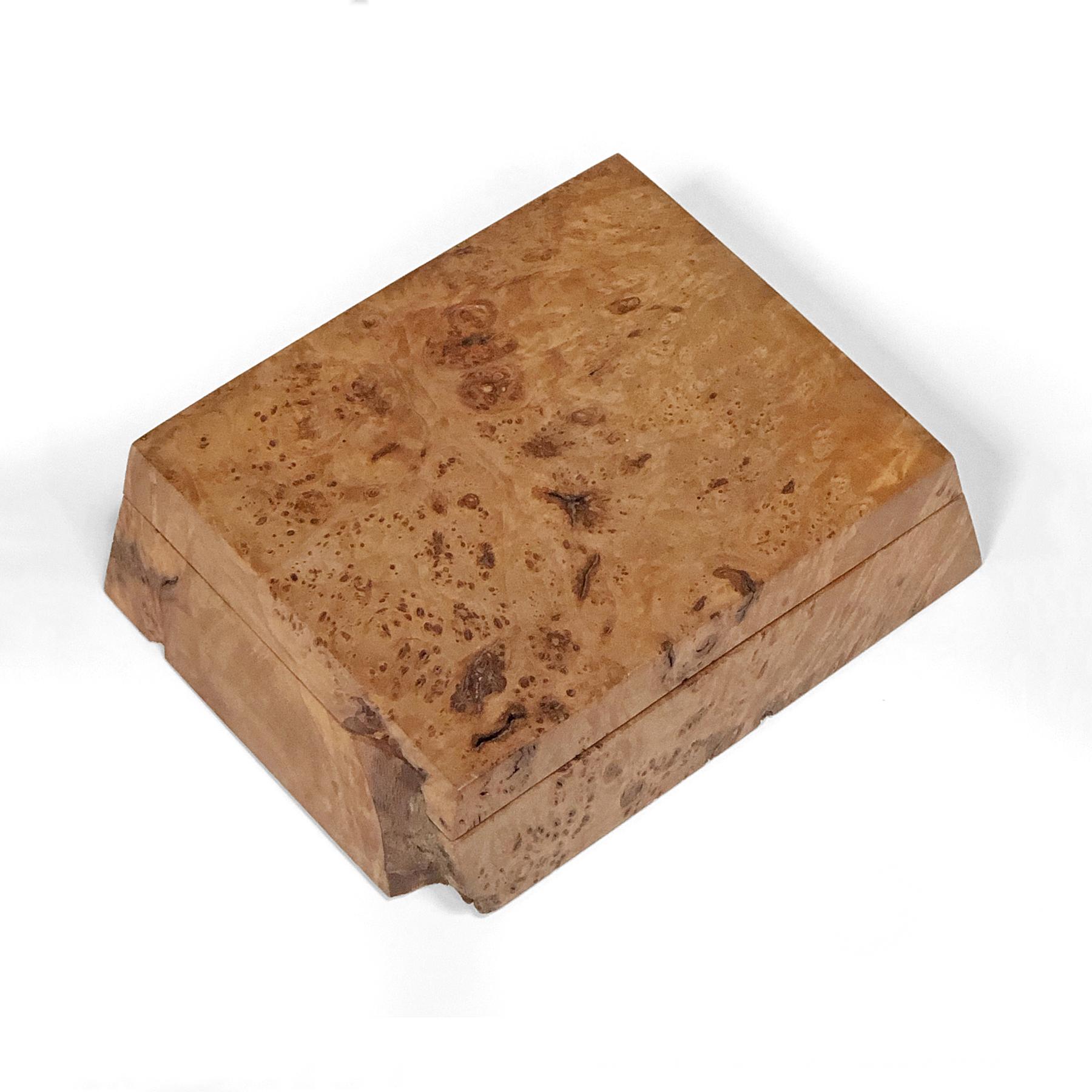 This lovely trinket box in Oregon bird’s-eye maple burl by Silverton, OR woodworker Michael Elkan has a beautiful, rich color and texture. Handcrafted from a single piece of wood, the box is hand signed and comes with the original literature.
