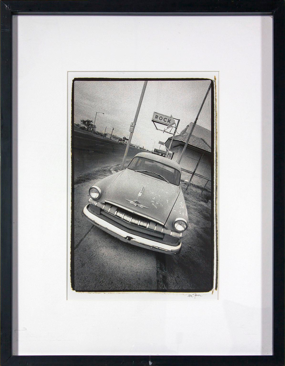 Michael Farr Black and White Photograph - Photo of vintage car outside of bar from original Hard Rock Hotel and Casino