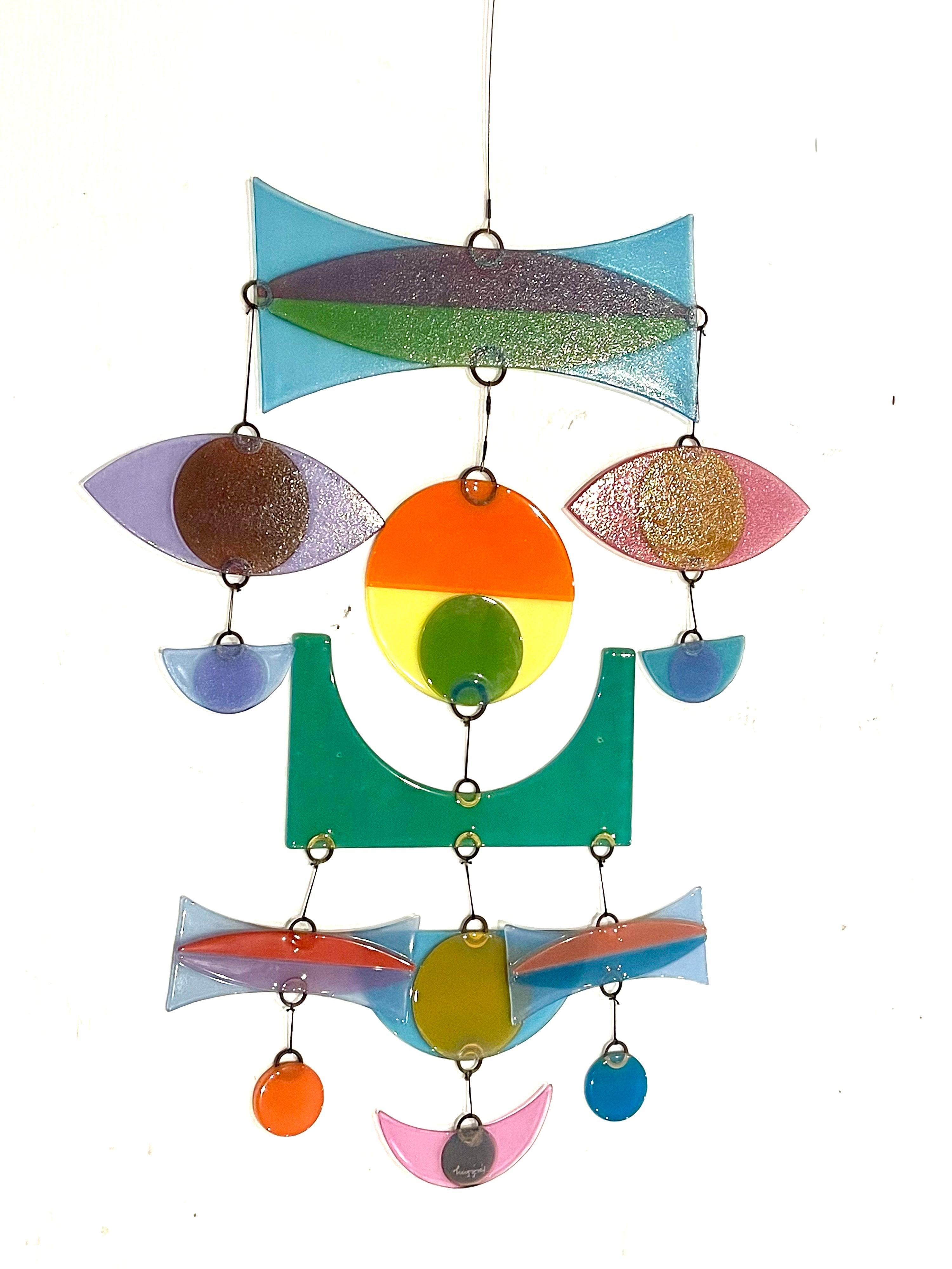 Exceptional 13 pieces fused multi-color glass mobile, signed Higgins.