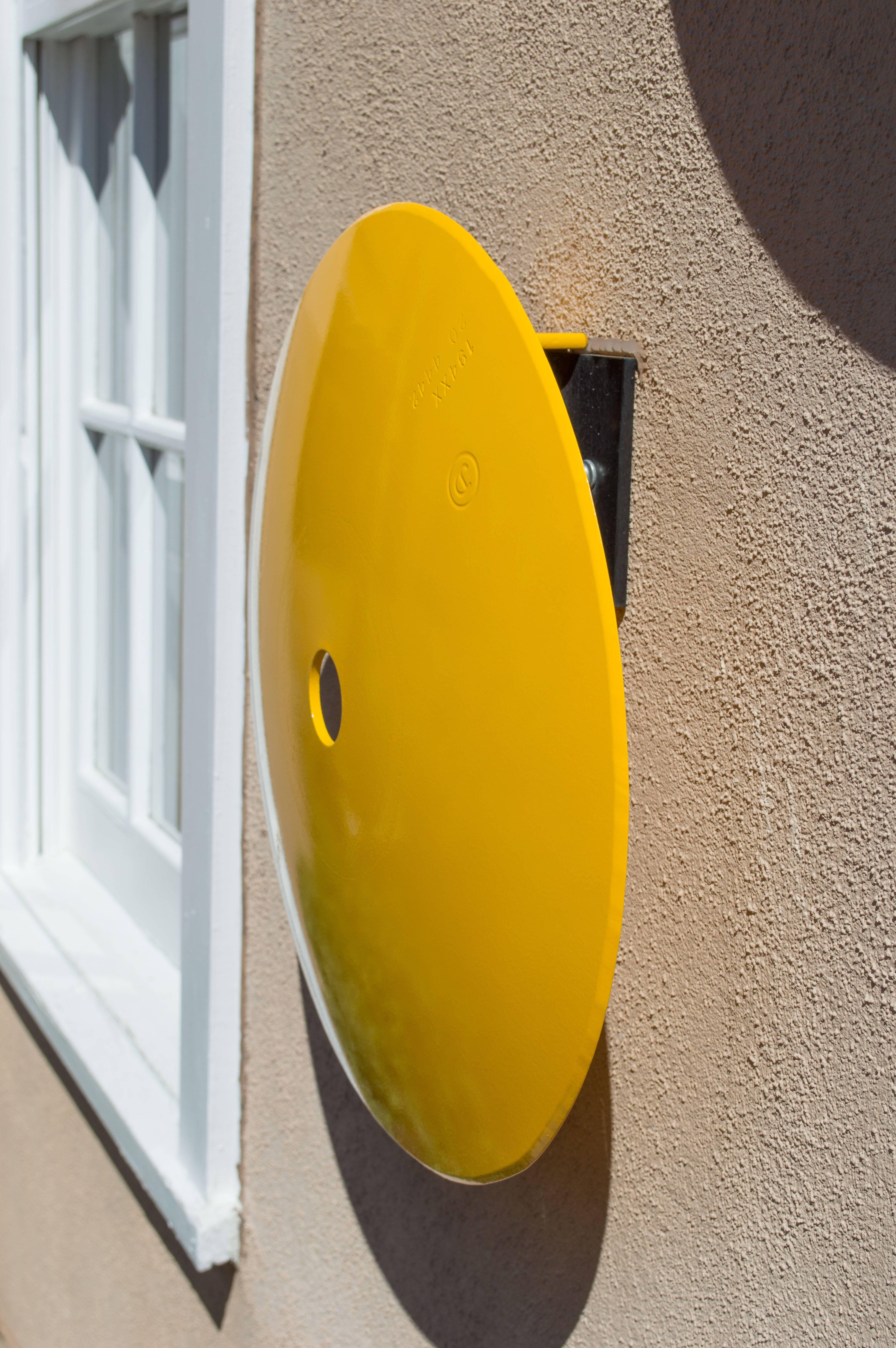 Terrace Disc, lemon yellow - Sculpture by Michael Freed and Adam Rosen