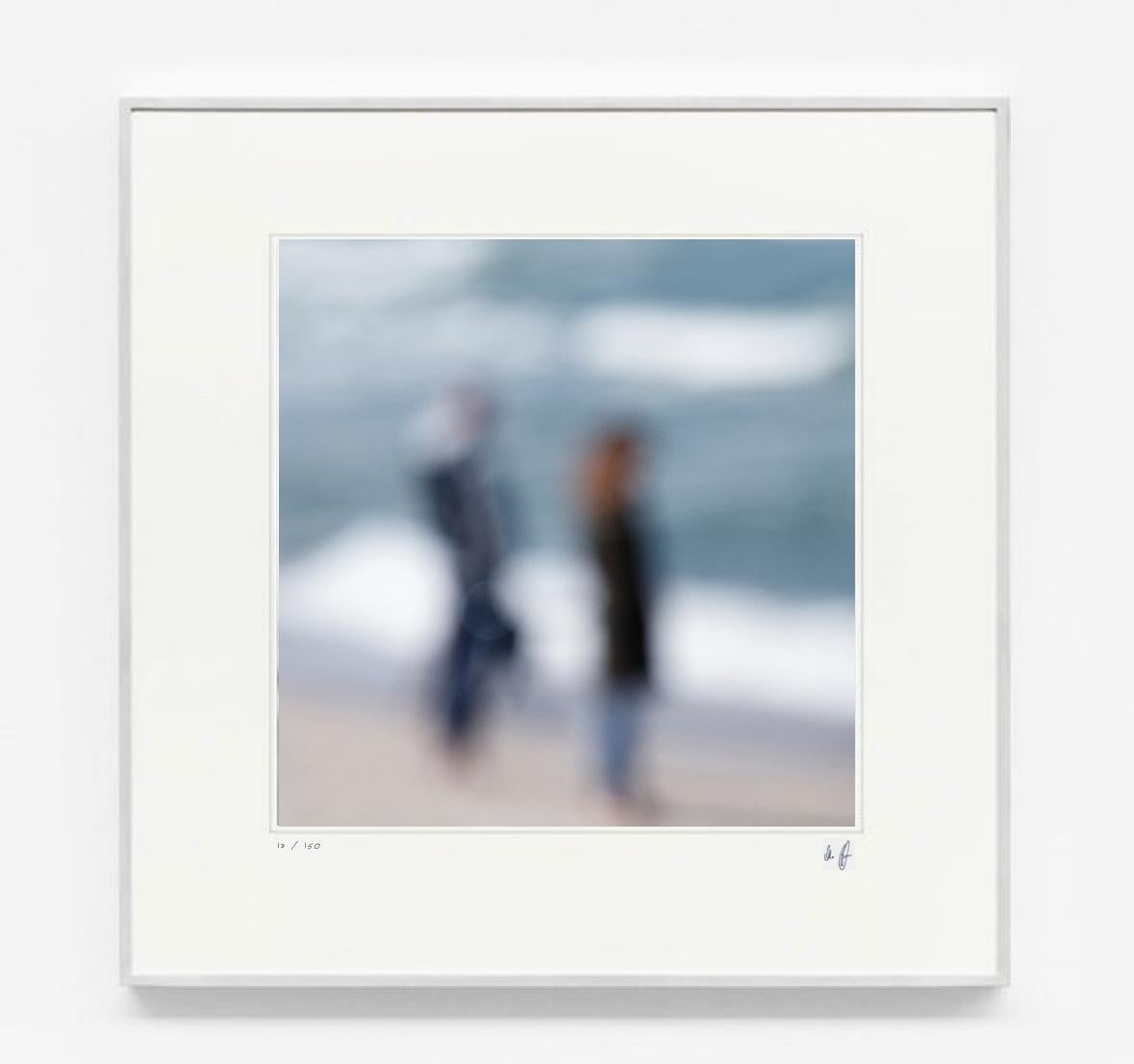 Michael Götze Landscape Photograph - Couple at Sea - contemporary abstract photography of a couple at the beach