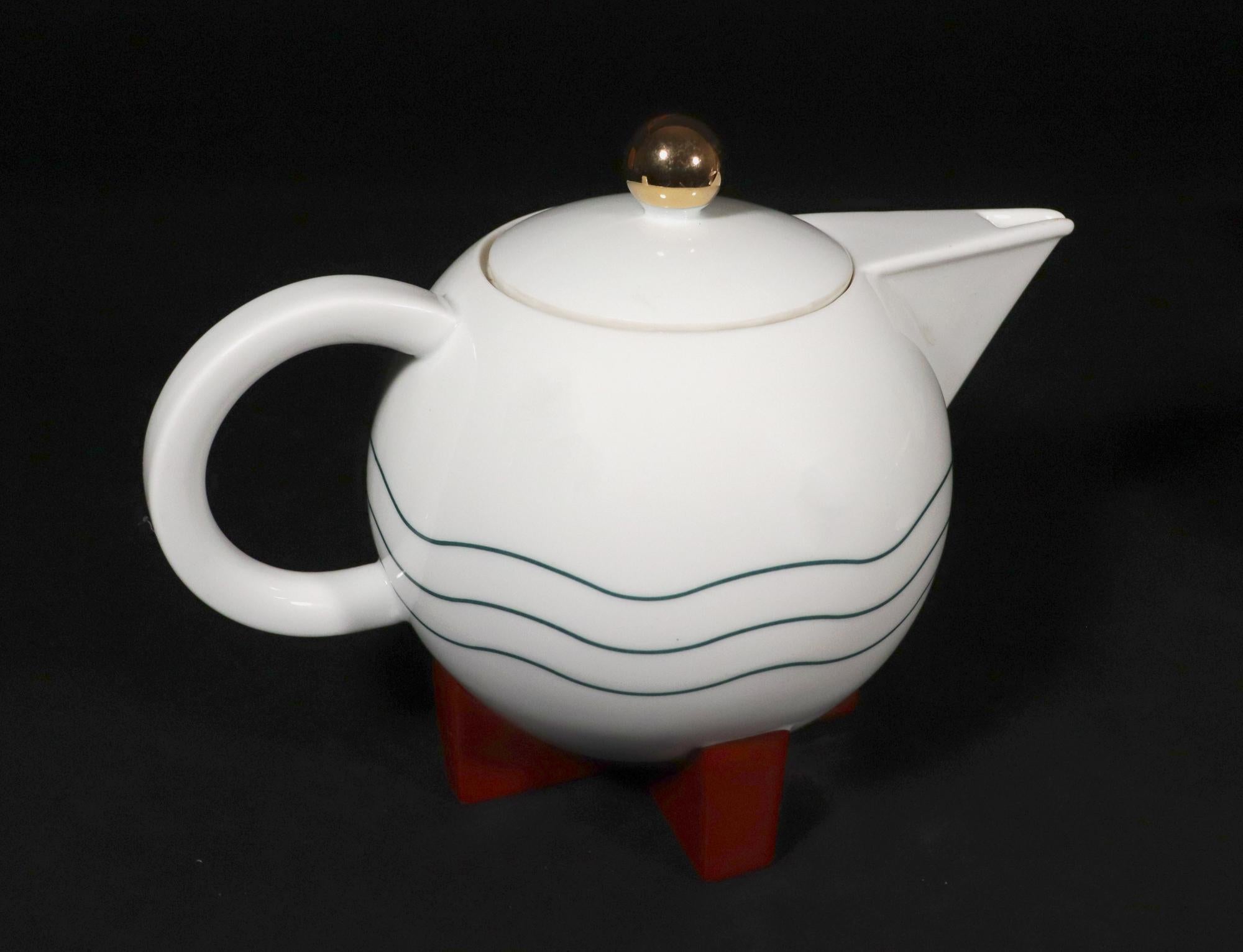 Little Dripper Porcelain Filter Drip Coffeemaker,
Designed by Michael Graves,
Manufactured by Swid Powell,
Dated 1987.

The complete set, with original instruction booklet, included a coffee pot and cover with a cup-shaped coffee drip for drip